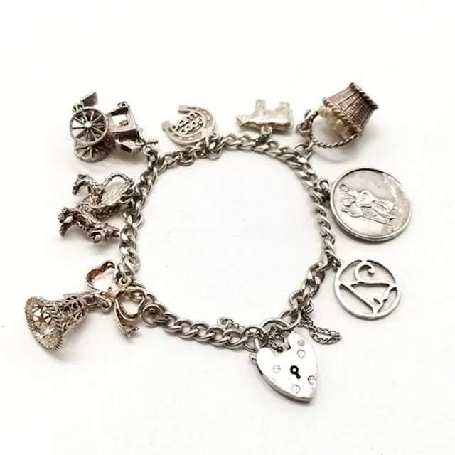 Georg Jensen silver charm bracelet with charms inc dragon, s...