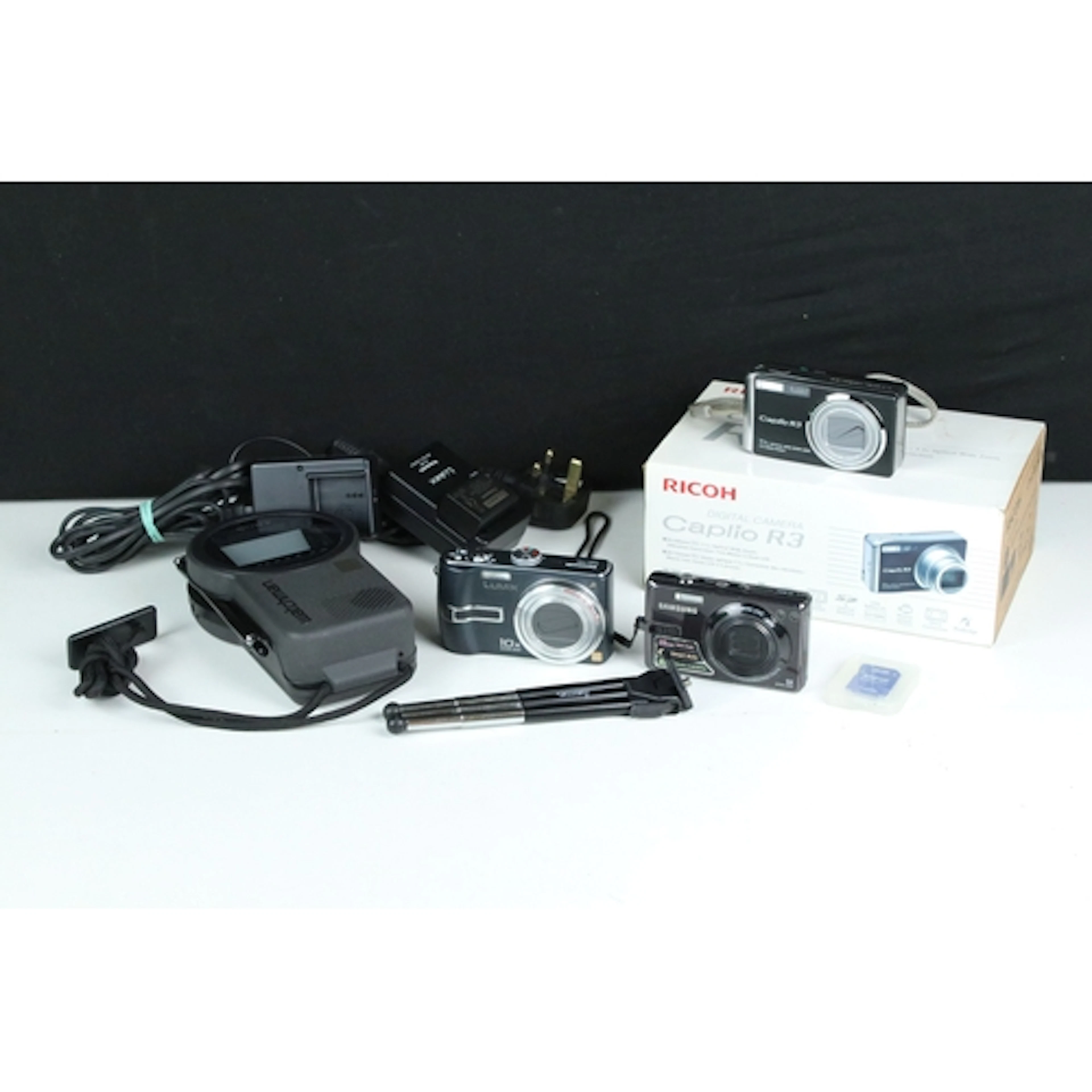Sony Watchman FD-250B portable television together with thre...
