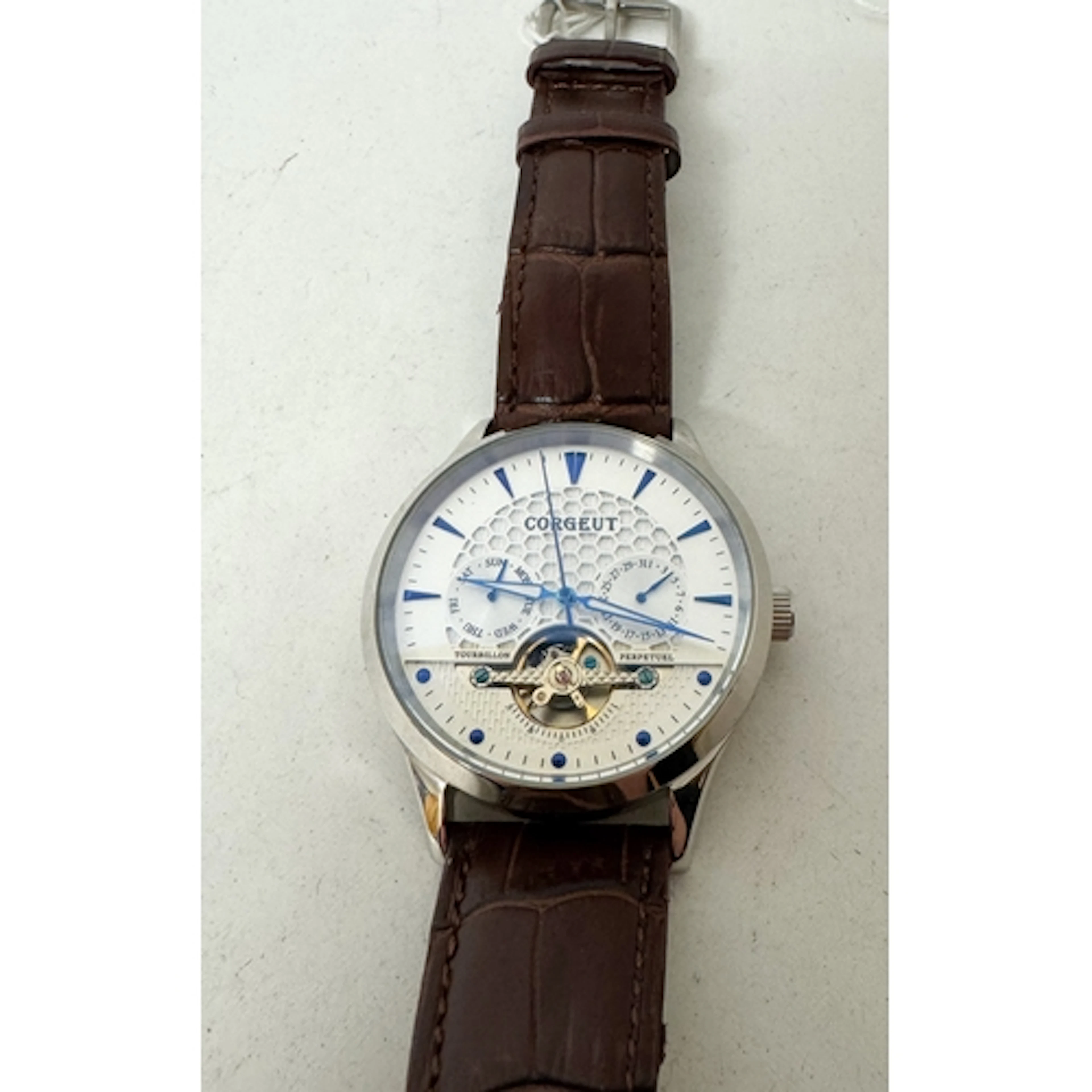 A Corgeut gent's automatic wrist watch on a later brown leat...