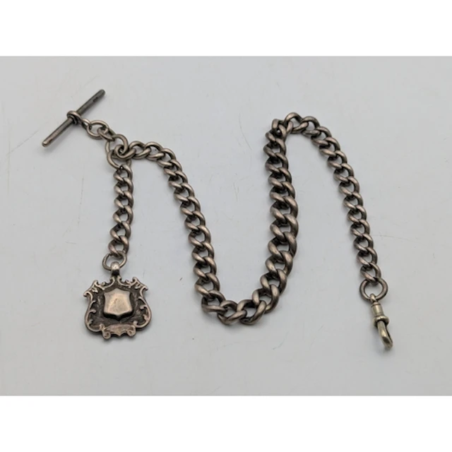 A silver pocket watch chain, having graduated sized links, w...