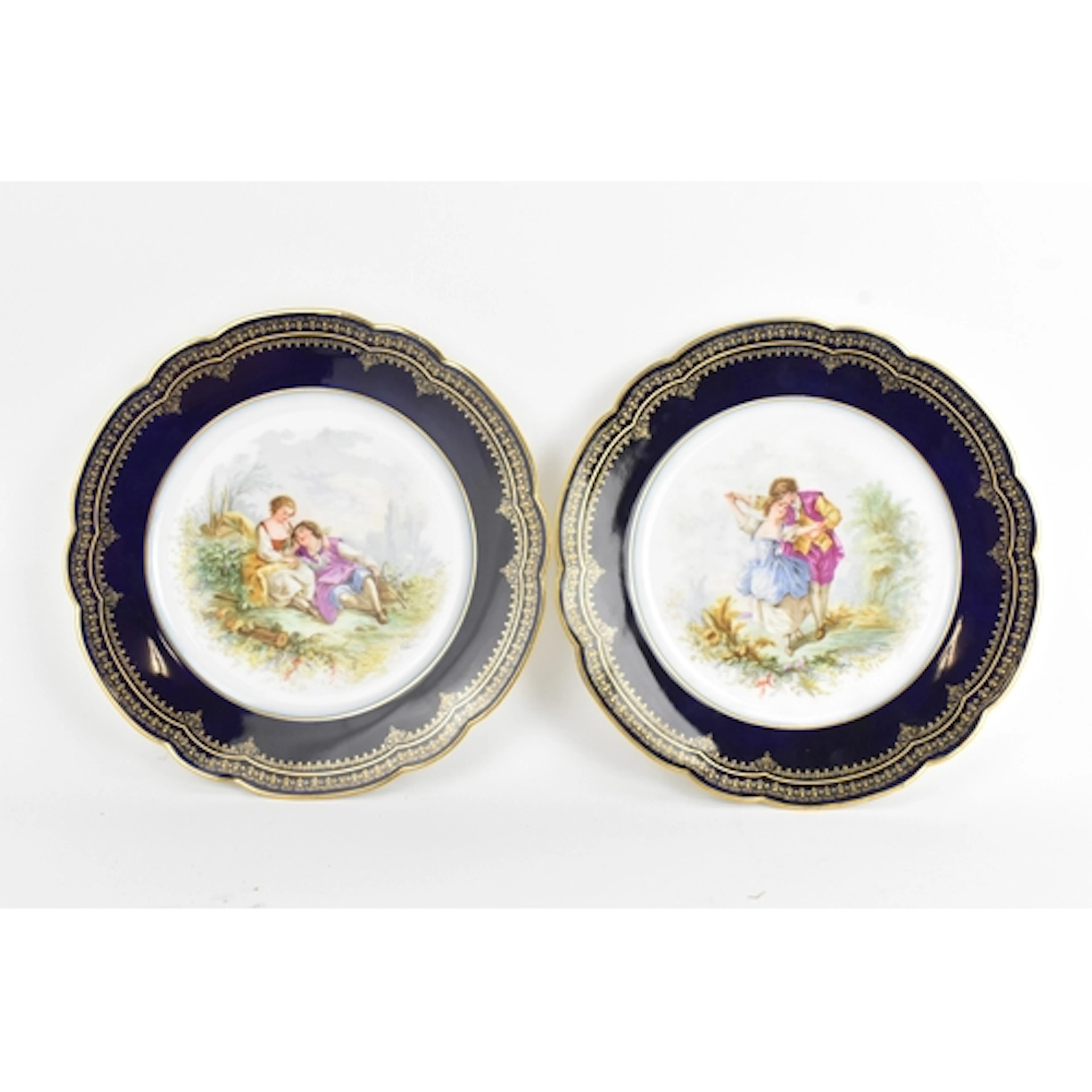 A pair of late 19th century porcelain plates, with printed S...