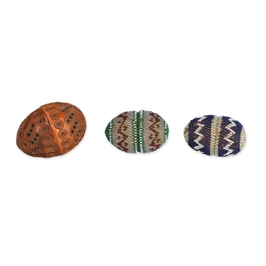 TWO PRISONER OF WAR BEADED GAME TOKENS Together with another...