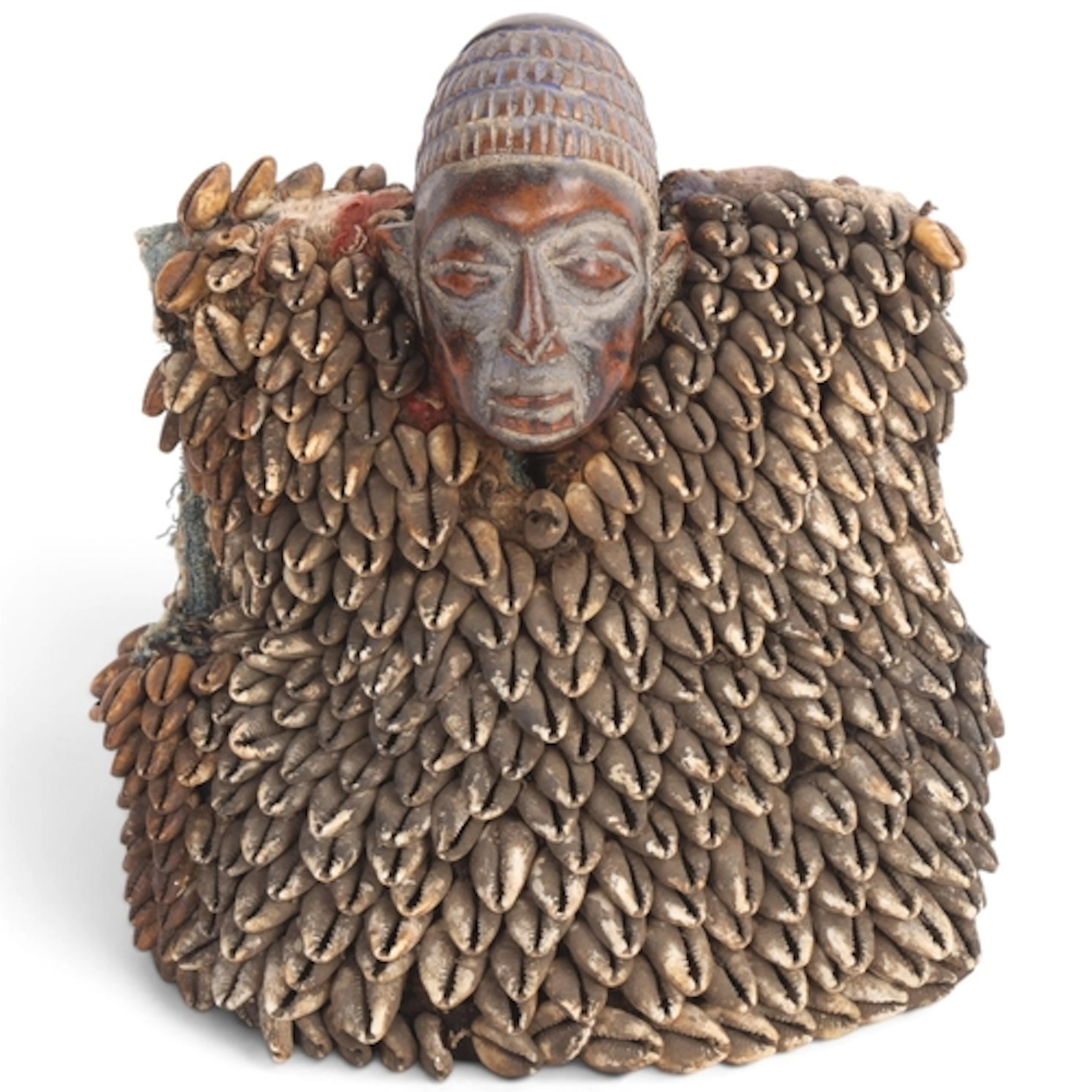 A Yoruba Ibeji doll, with cowrie shells, height 21cm