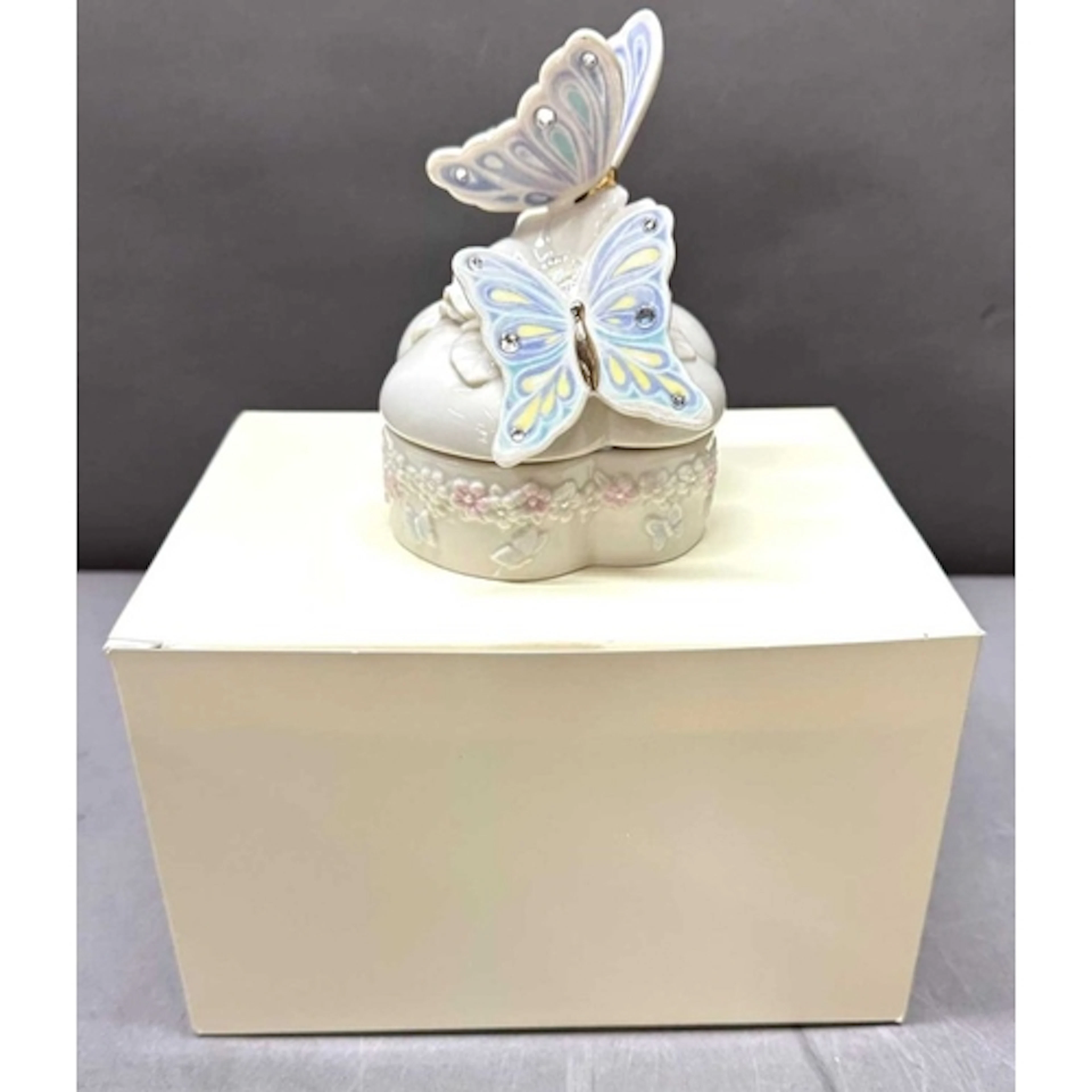 A fine china Lenox Wings of Splendor butterfly music box wit...
