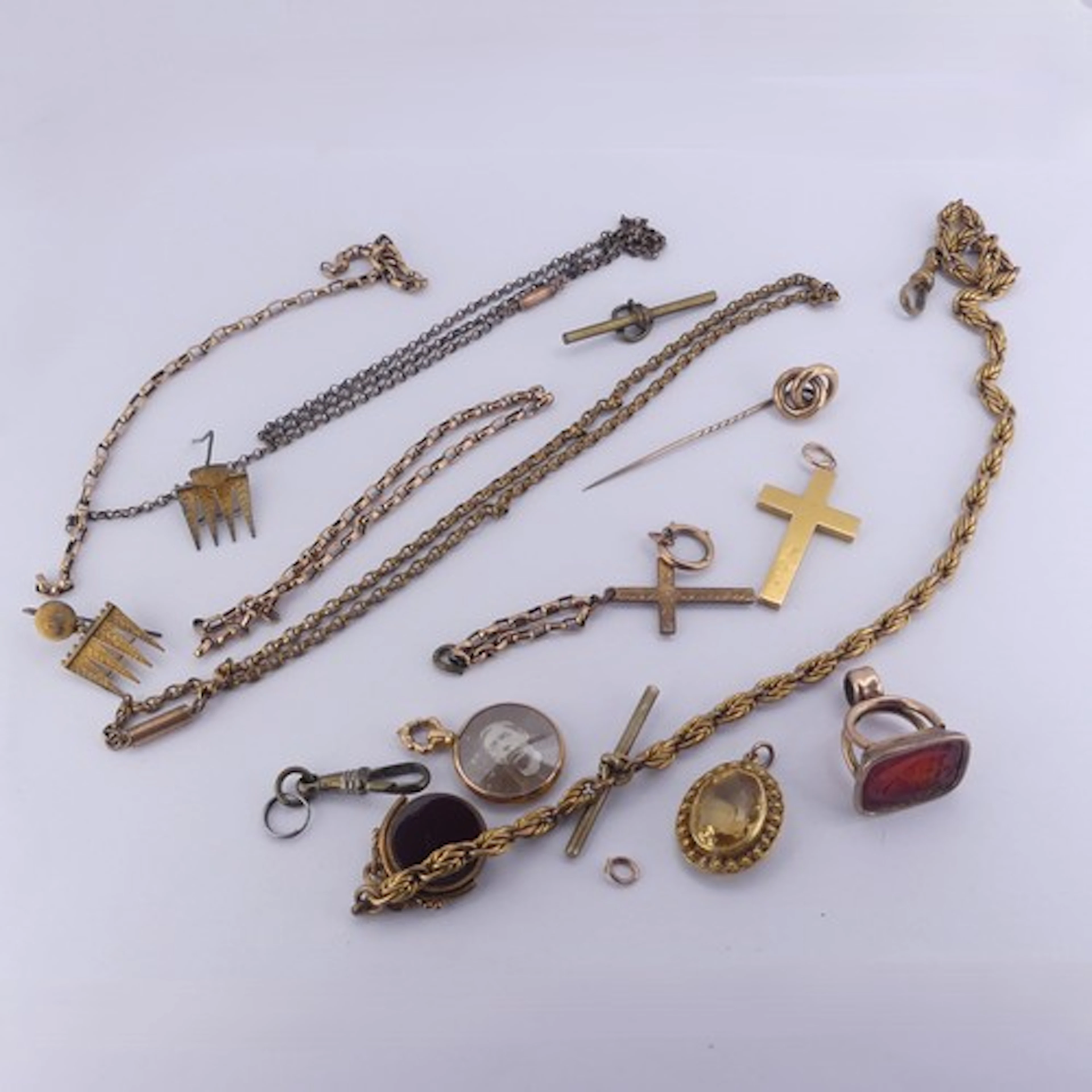 A 15ct yellow gold Cross Pendant, 37mm long, 3.2g, together ...