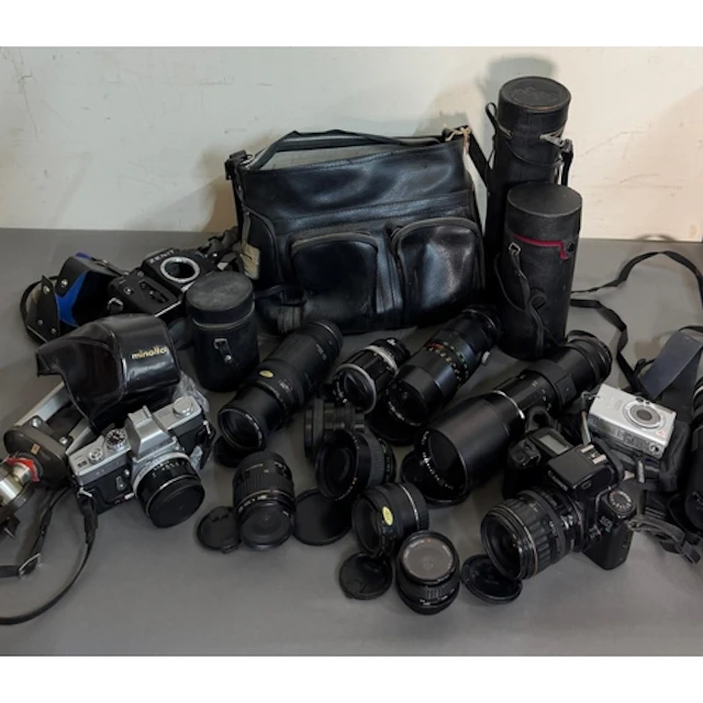 A selection of cameras and camera equipment. Various makers ...