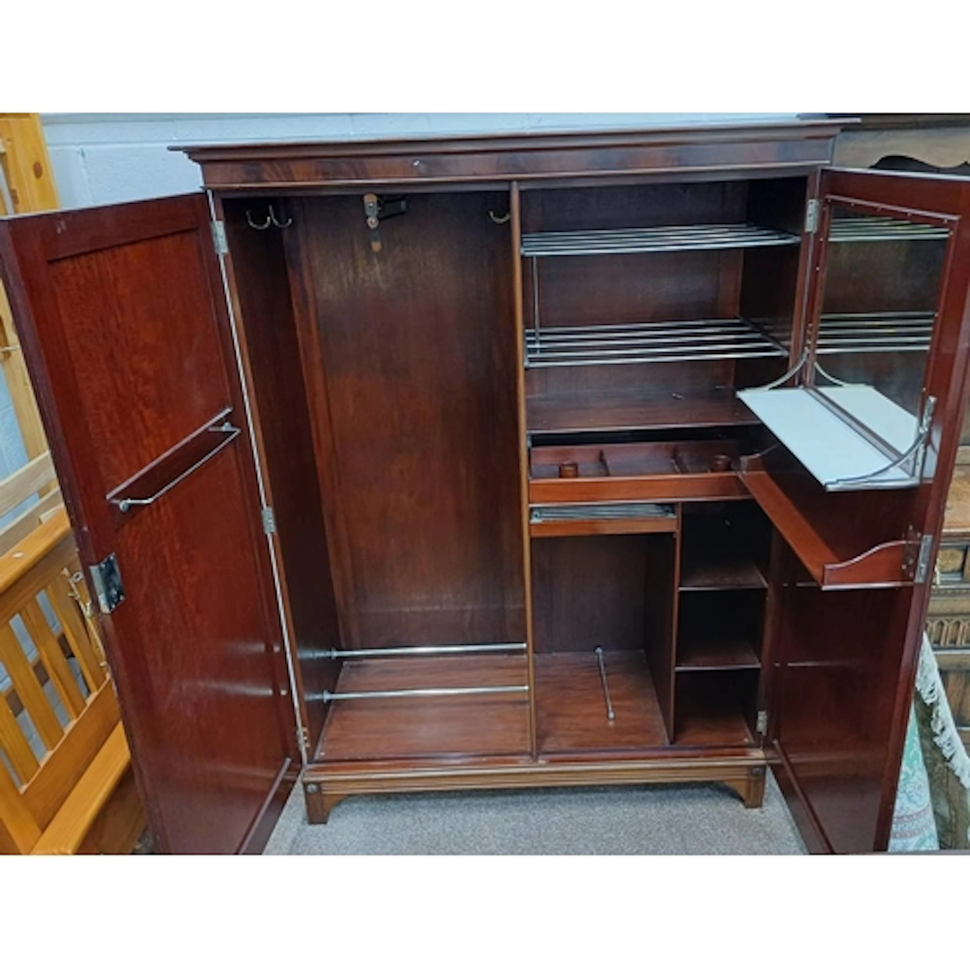 MAHOGANY COMPACTUM STYLE WARDROBE WITH 2 PANEL DOORS OPENING...