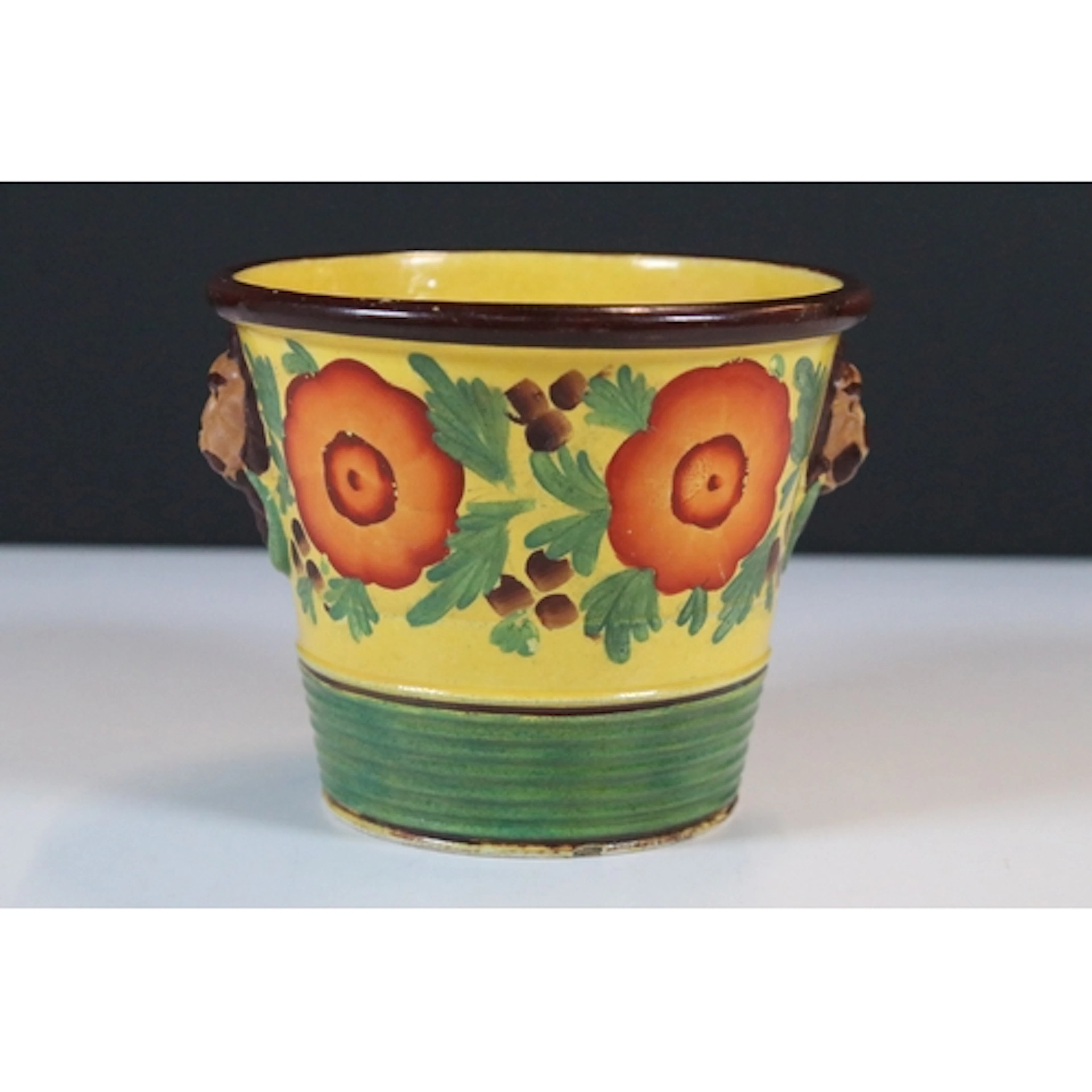 19th century pottery flared plant pot, with canary yellow gr...