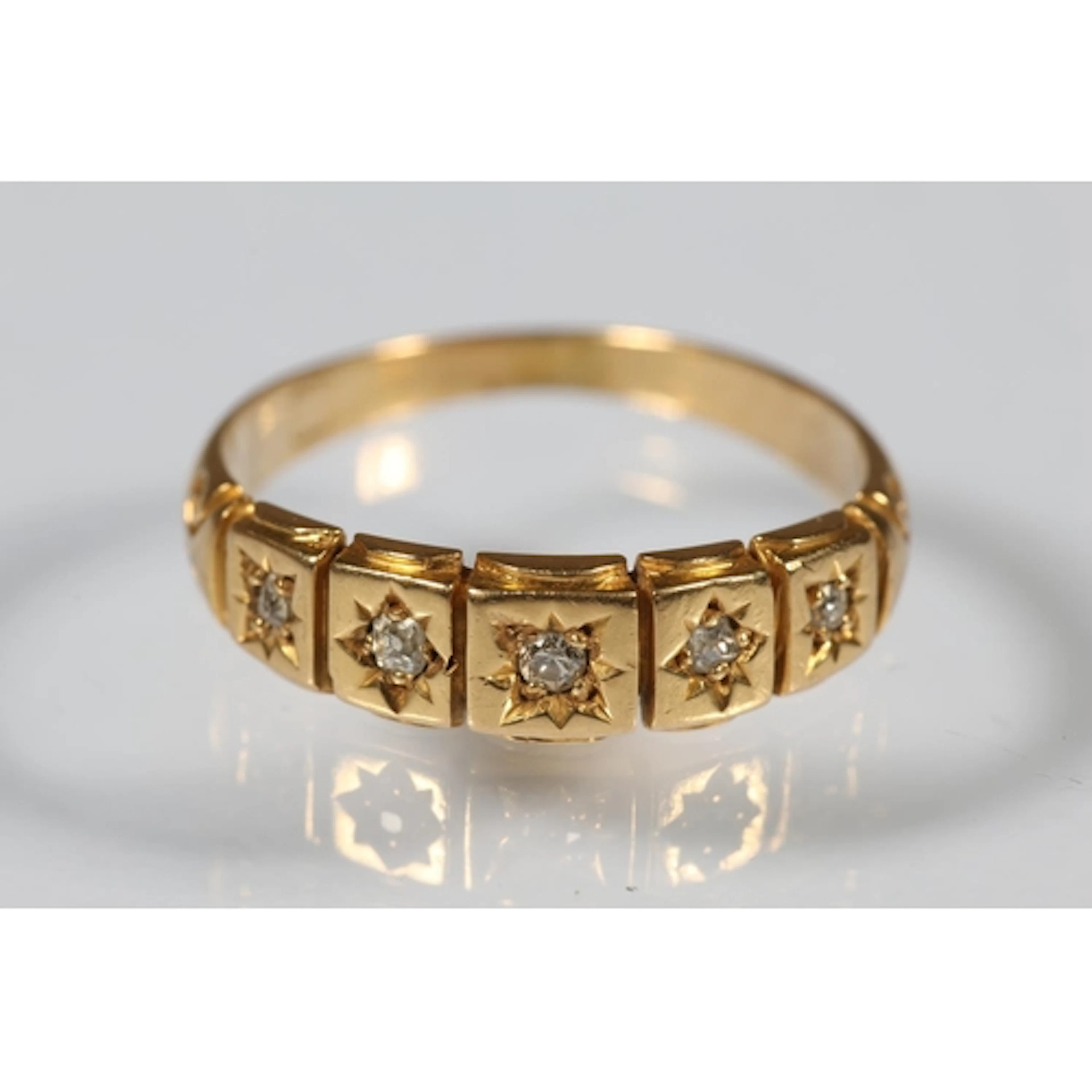 Gold and diamond five-stone ring, size M/N, 3.2g gross.&nbsp...