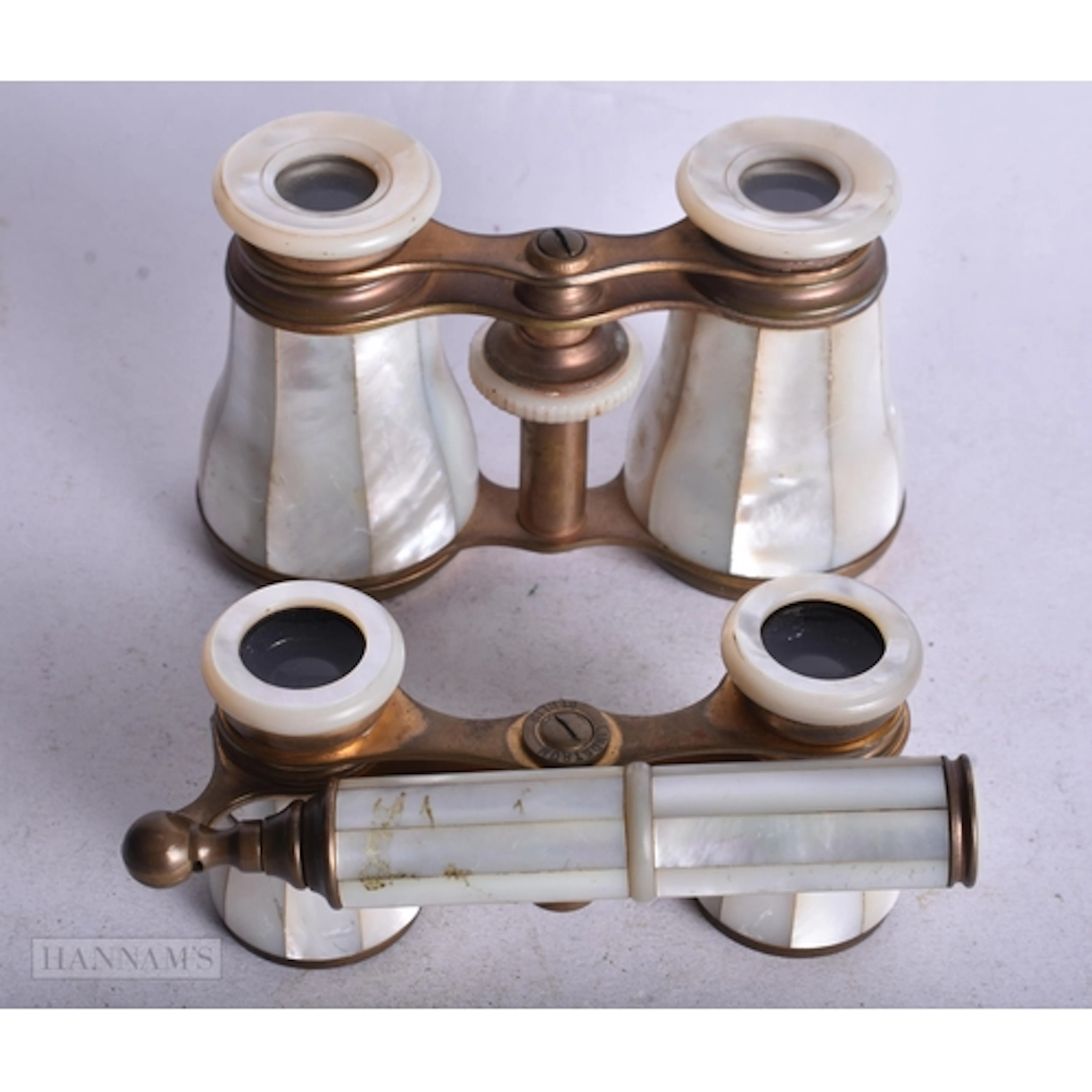 Two Pairs of Mother of Pearl Cased Opera Glasses, one with h...