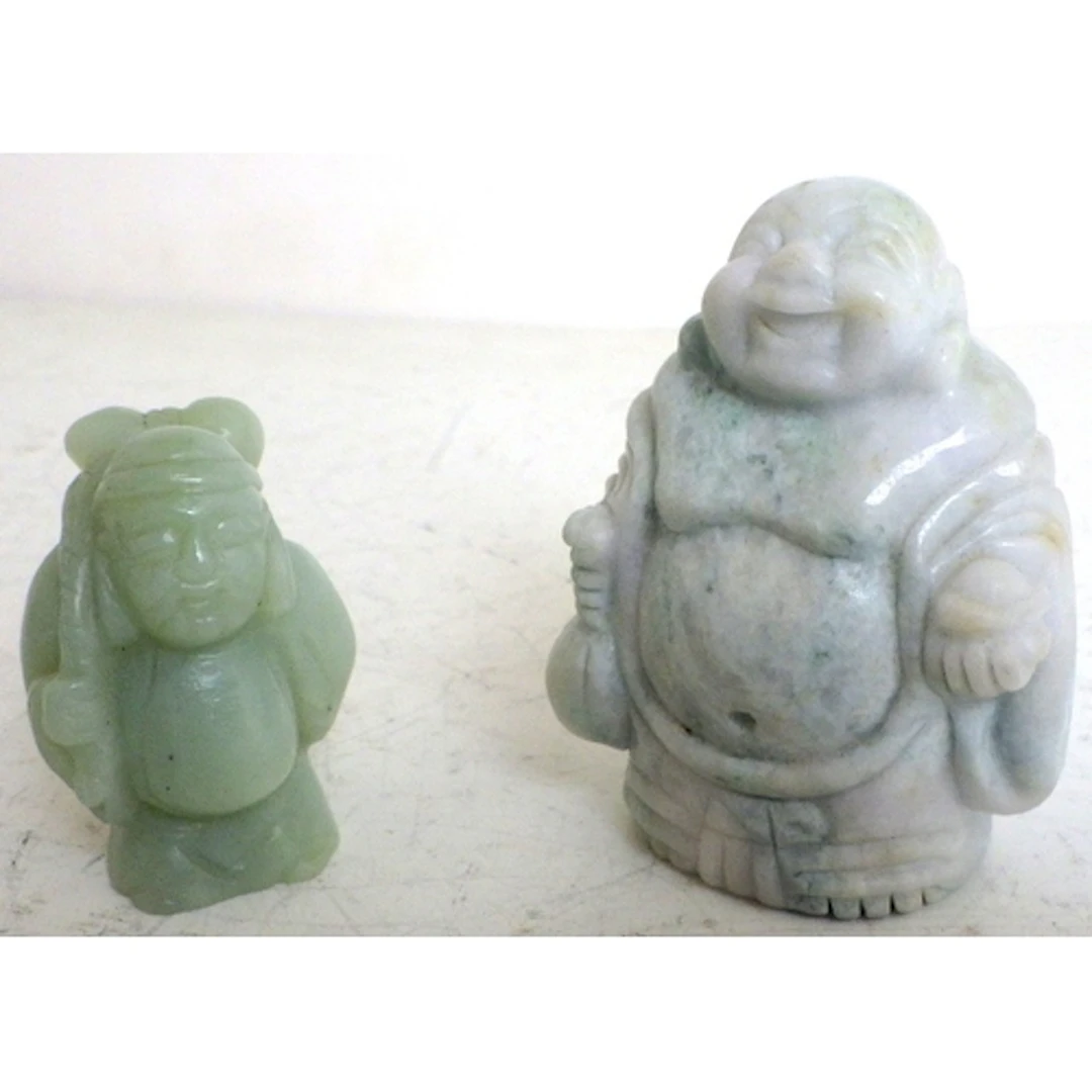 A small carved stone Buddha & a carved Oriental figure of a ...