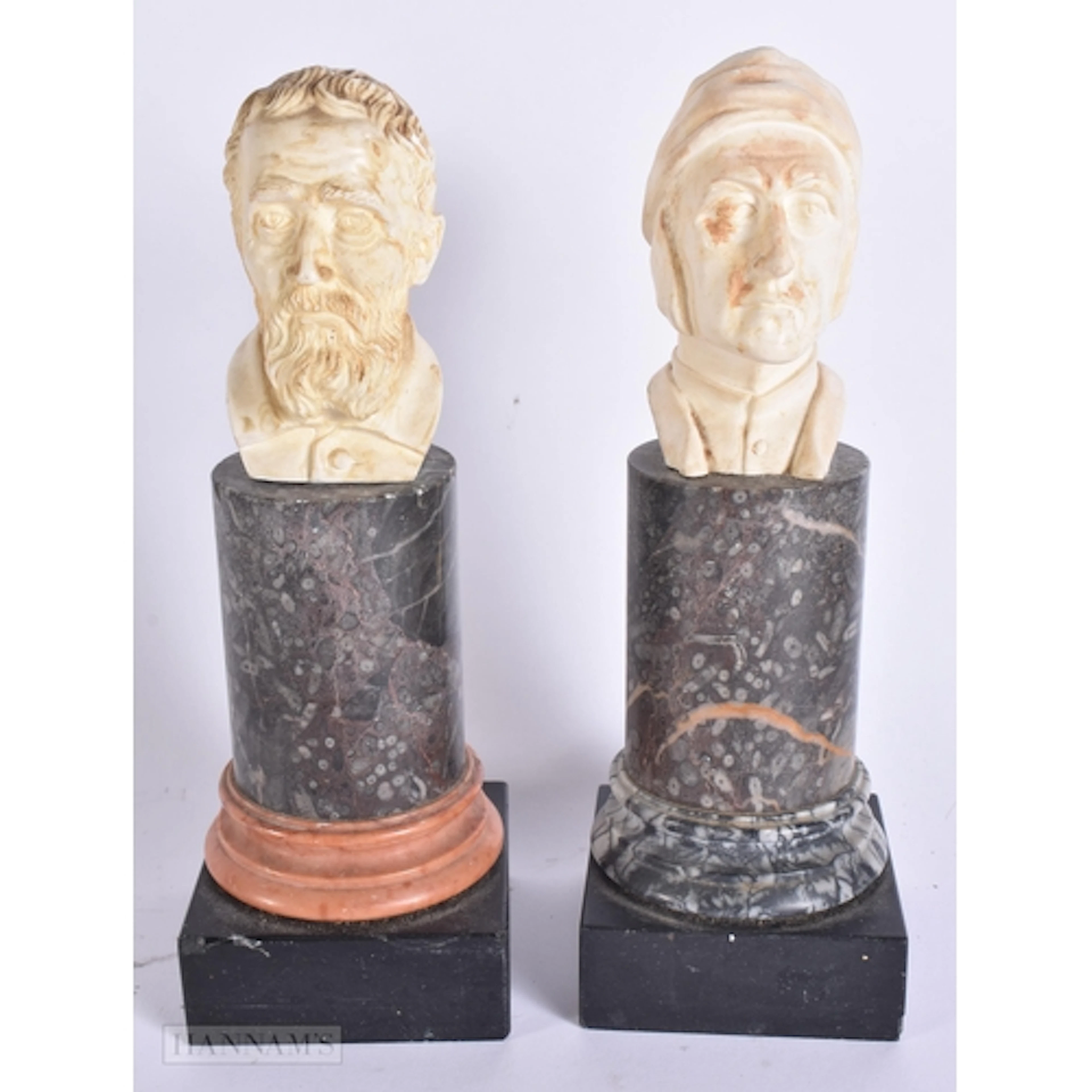 A PAIR OF EUROPEAN BUSTS upon marble pedestals. 22 cm high.