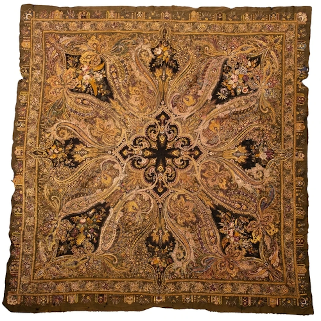 A fine Austrian silk embroidered cotton 'piano shawl', circa...
