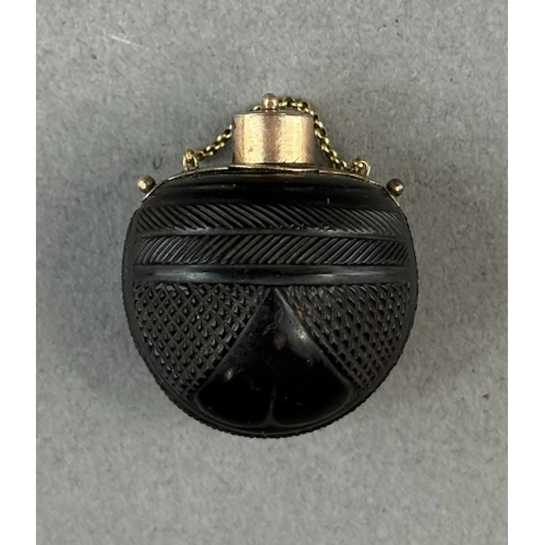 Decorative Arts: a 19th century yellow metal mounted scent b...
