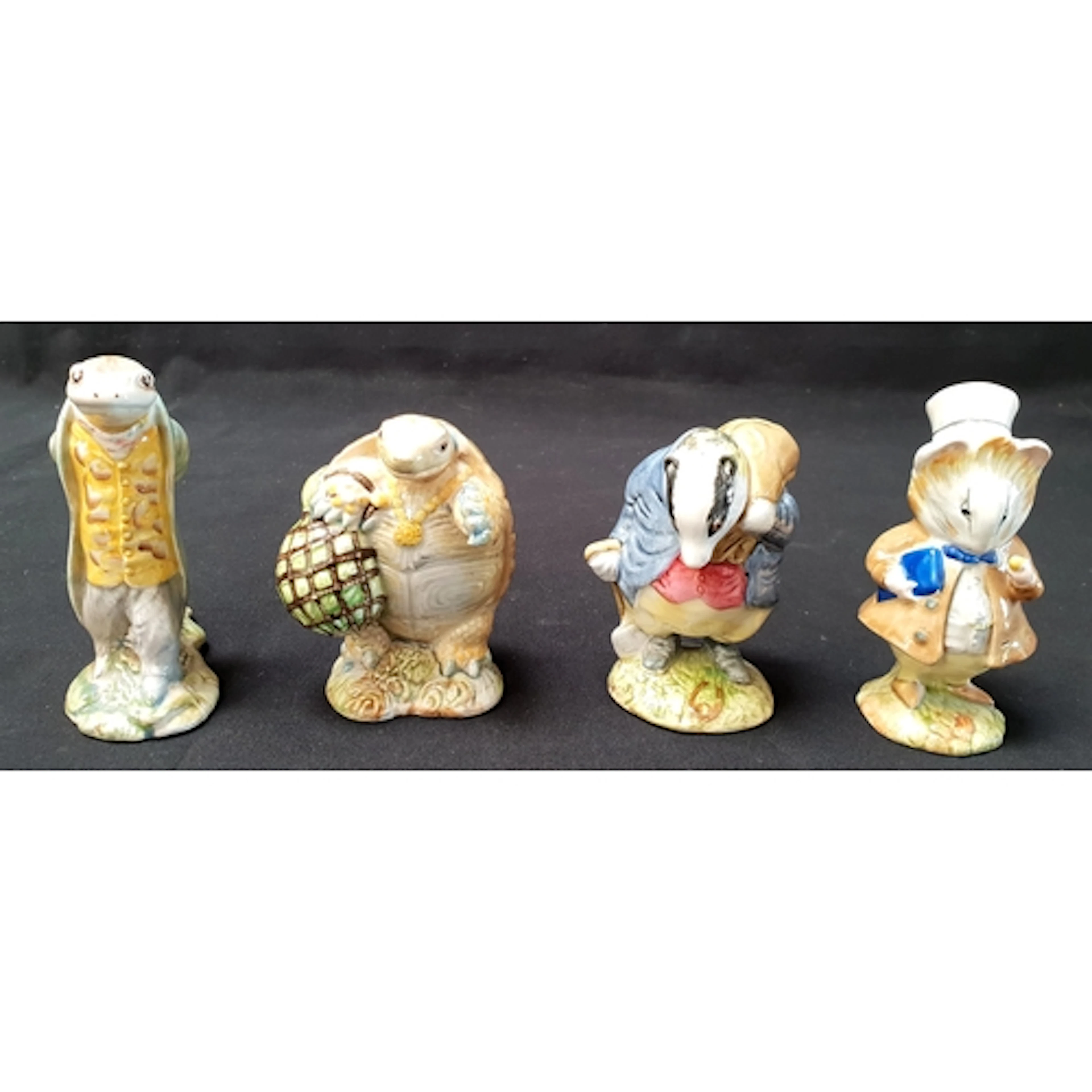 FOUR BESWICK BEATRIX POTTER FIGURINES comprising Mr Alderman...