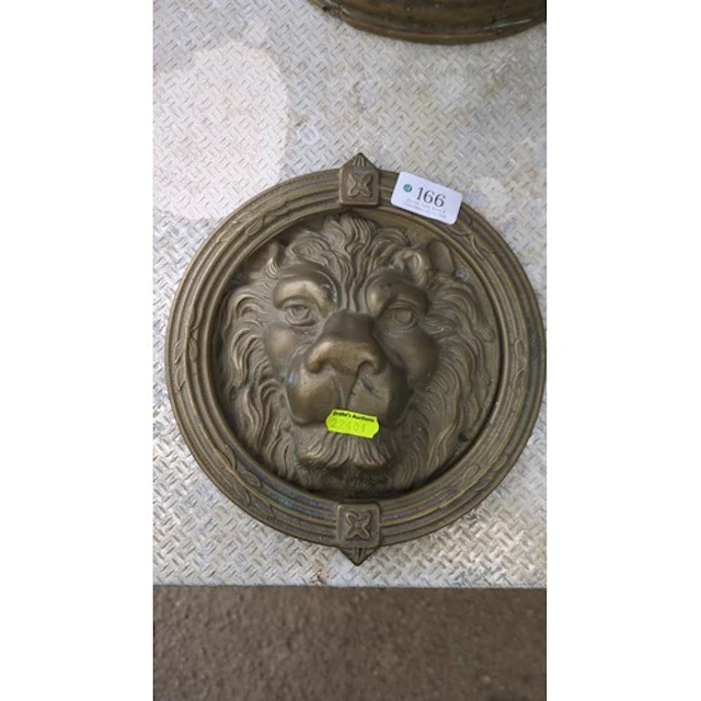 Brass lion-mask door knocker