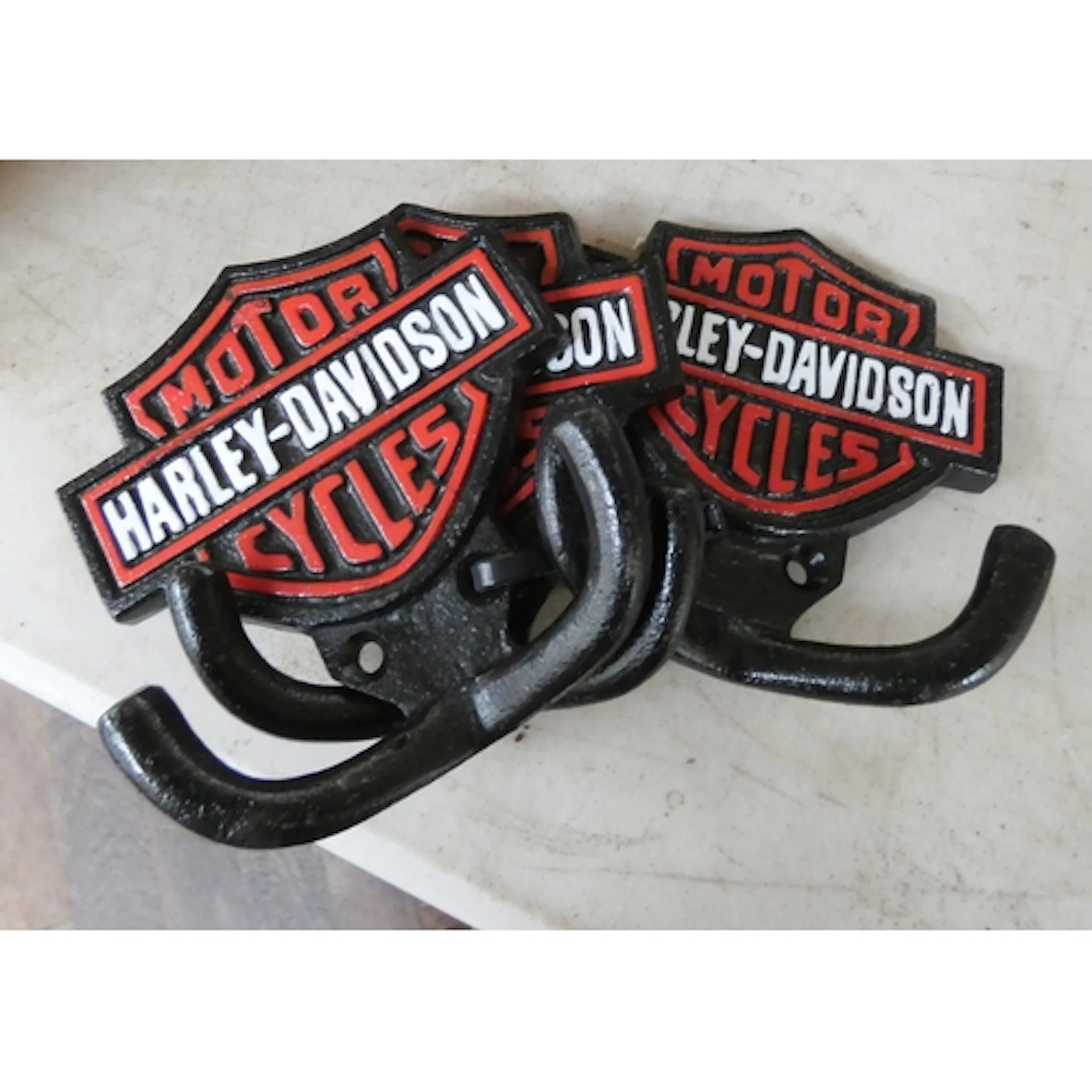 Three Harley Davidson motorcycle coat hooks