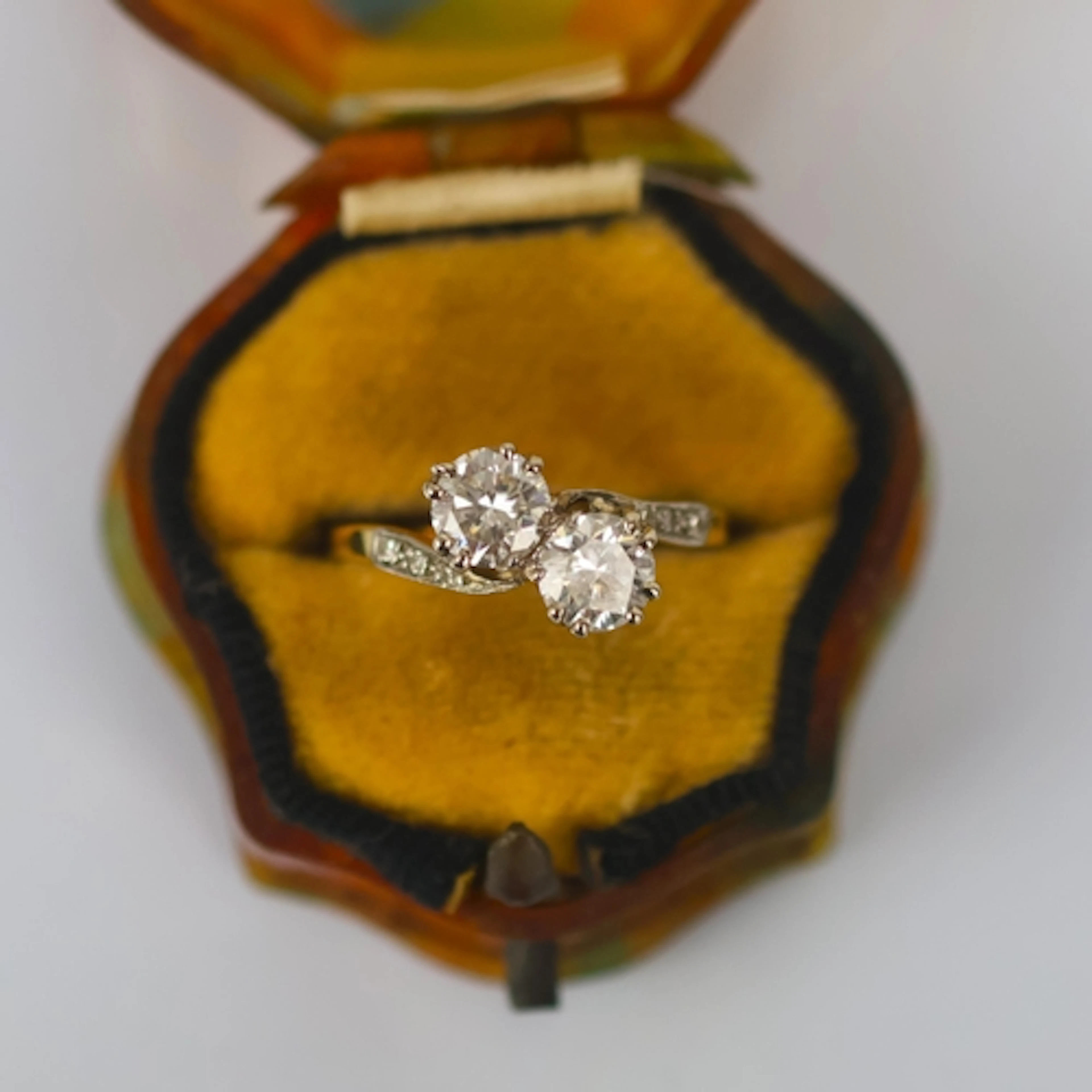 A mid 20th century diamond toi et moi ring, the two transiti...