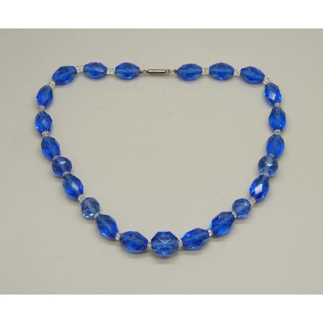 A circa 1930s Art Deco blue and white faceted glass stone ne...