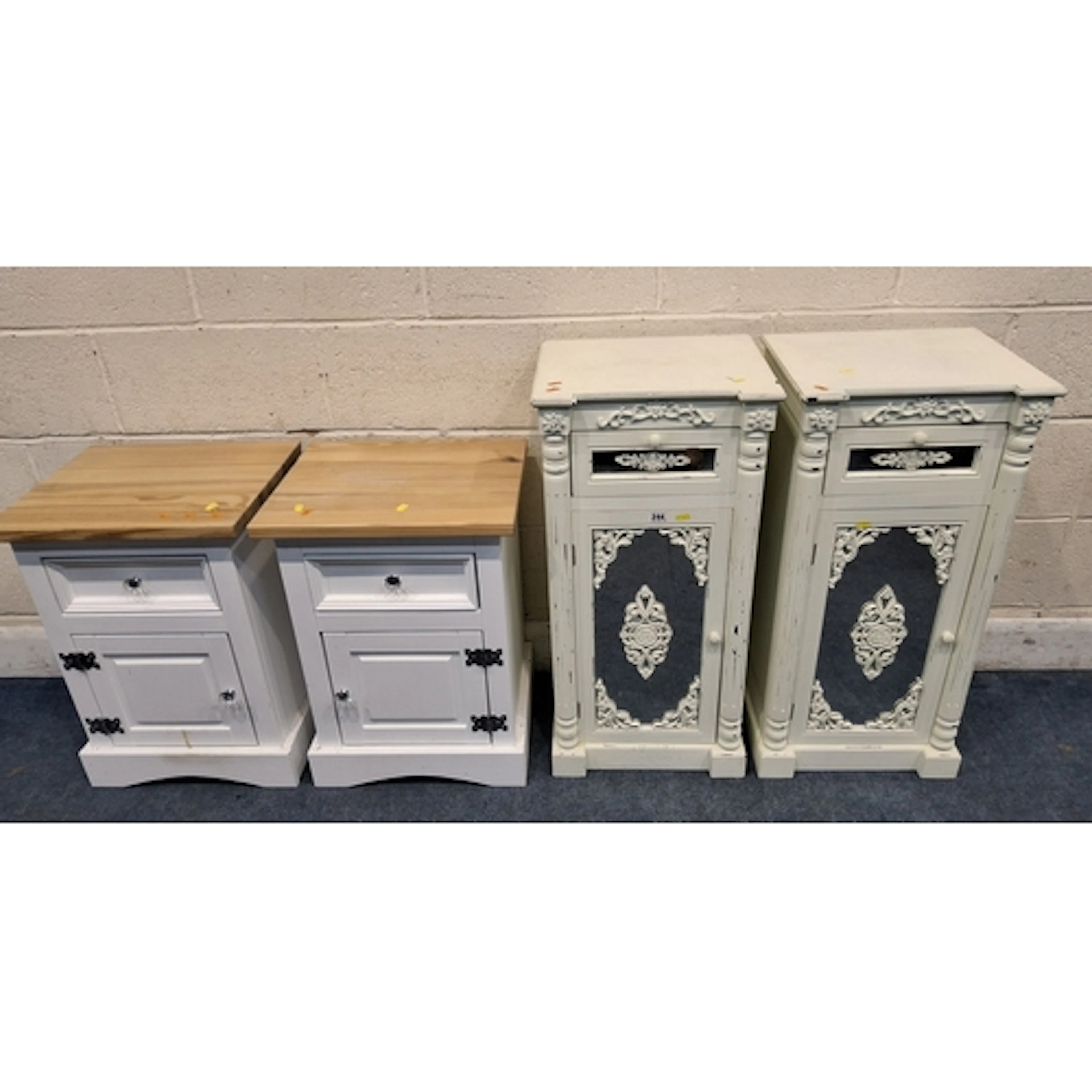 A PAIR OF PAINTED BEDSIDE CABINETS, with a mirrored drawer a...