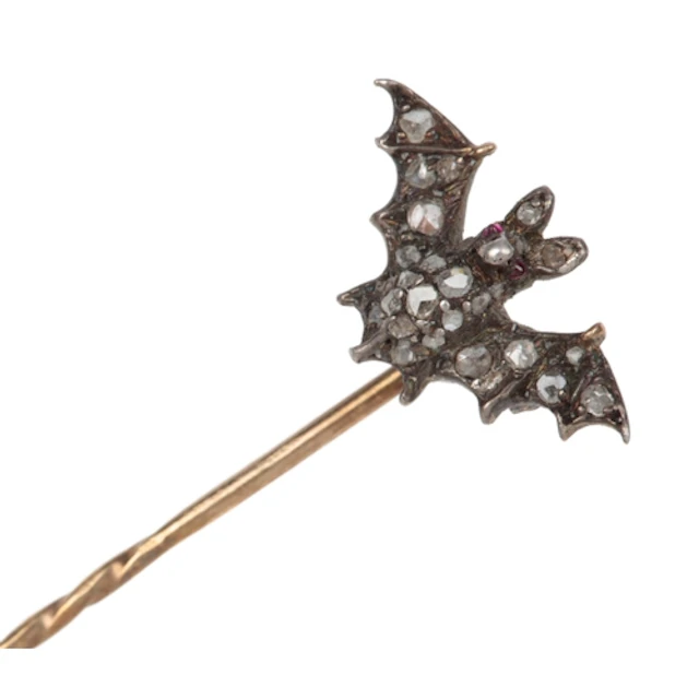 A diamond novelty stick pin, early 20th century, designed as...