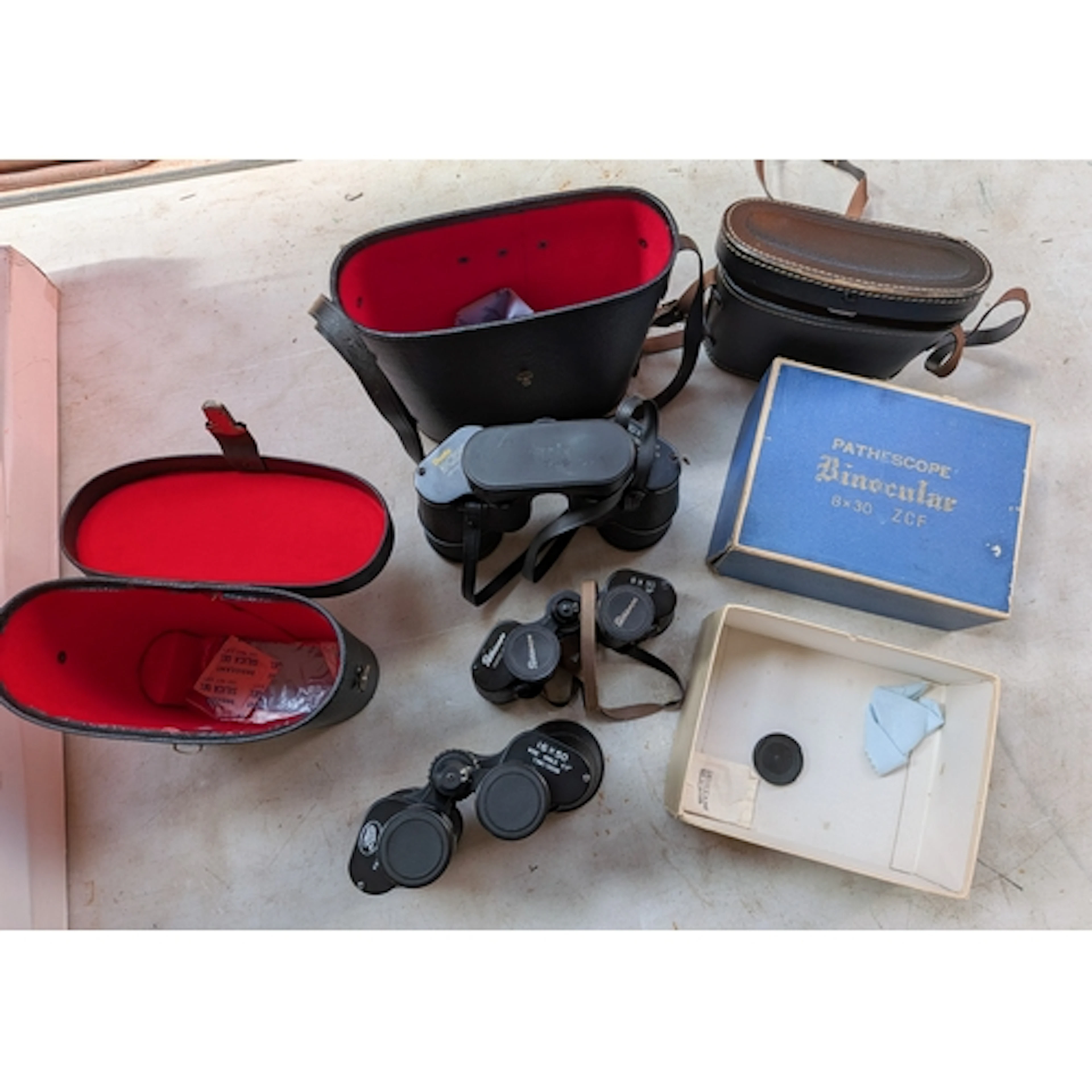 A pair of Boots Admiral 10x50 binoculars, Boots 16x50 binocu...