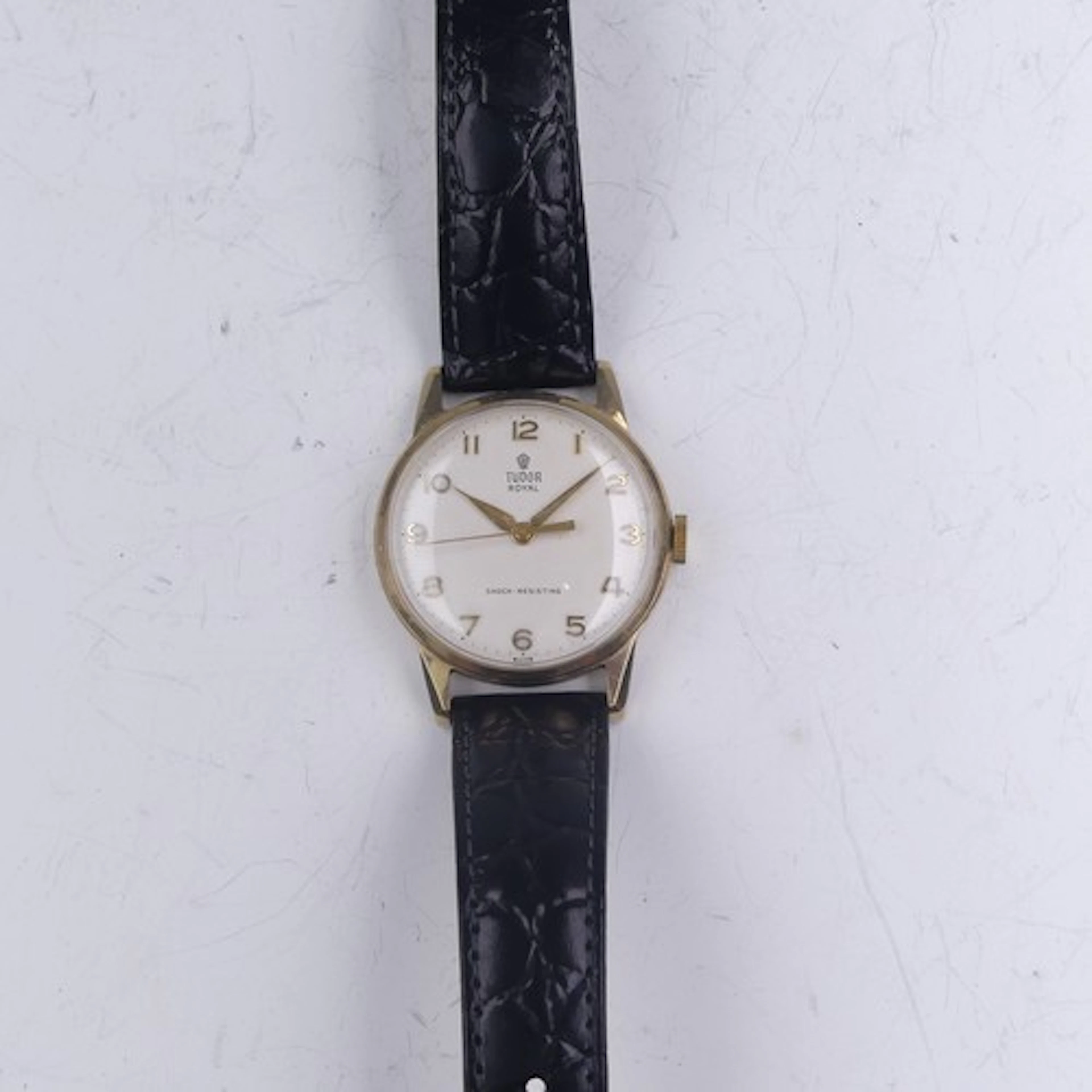 A 9ct gold Tudor Royal Wristwatch, the signed dial with gilt...