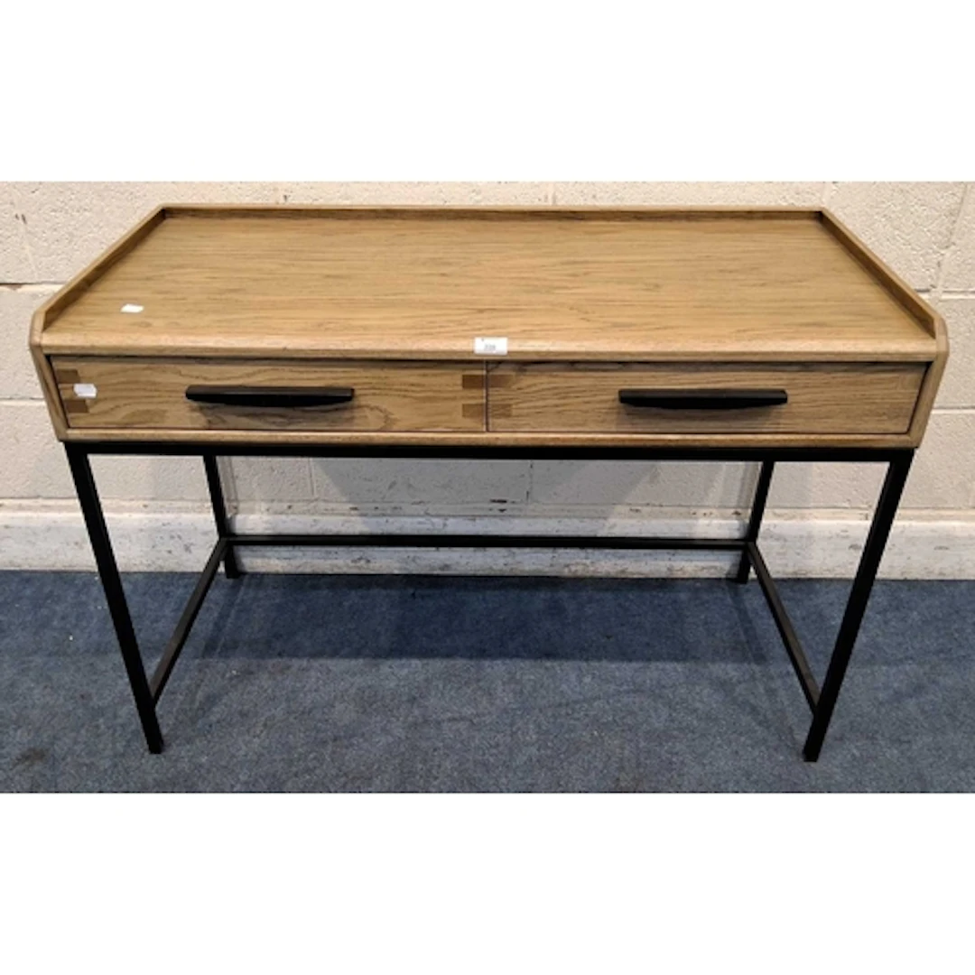 A MODERN LIGHT OAK SIDE TABLE, with a raised gallery, two fr...
