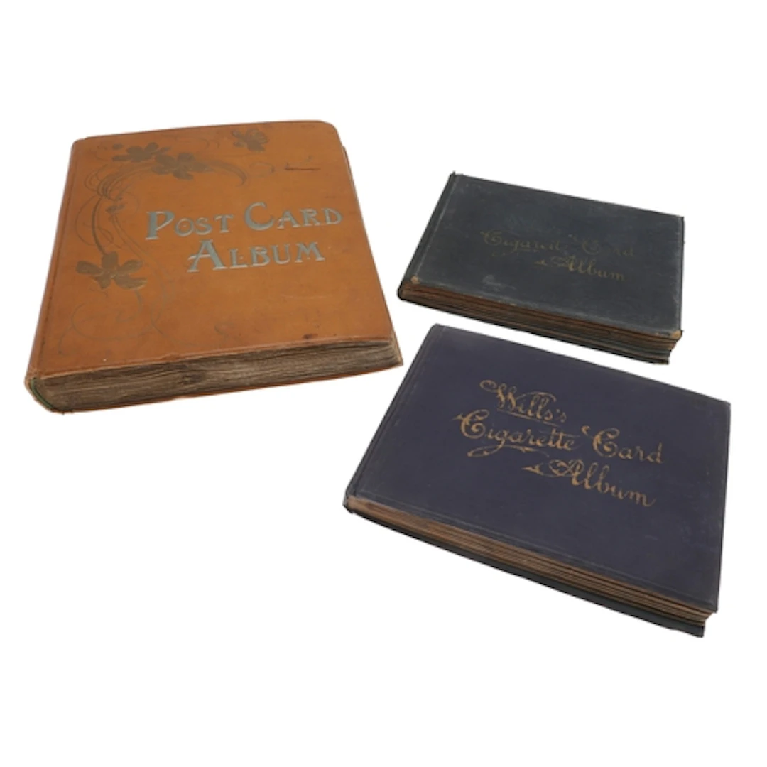 LARGE POSTCARD ALBUM & CIGARETTE CARD ALBUMS. Including a la...
