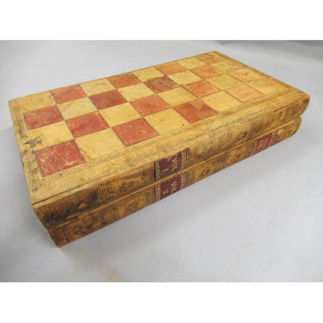 Antique leather covered folding chess board in the form of t...
