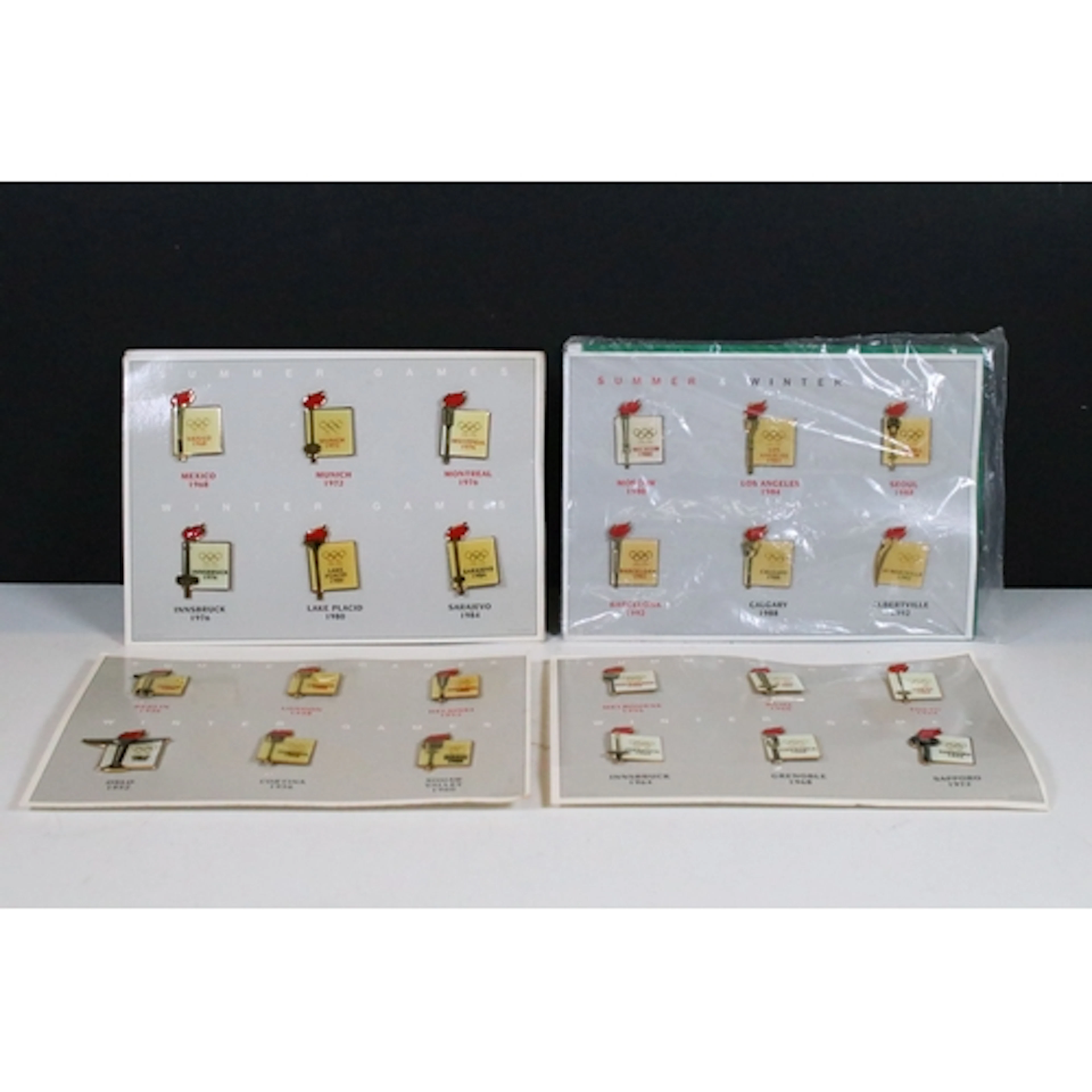 A collection of limited edition Winter Olympic games collect...
