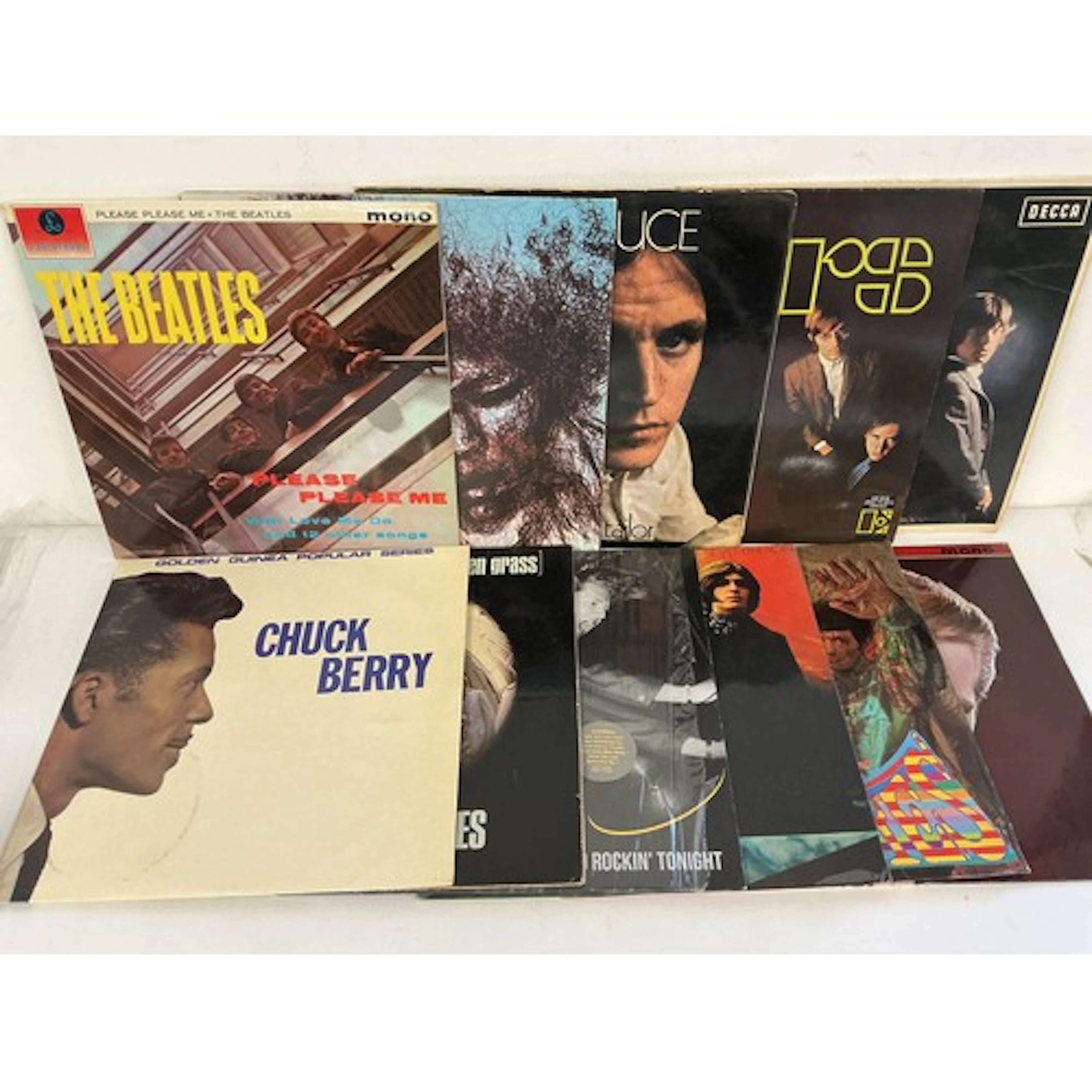 A record case of 60s rock and pop LPs, EPs and 7” singles by...