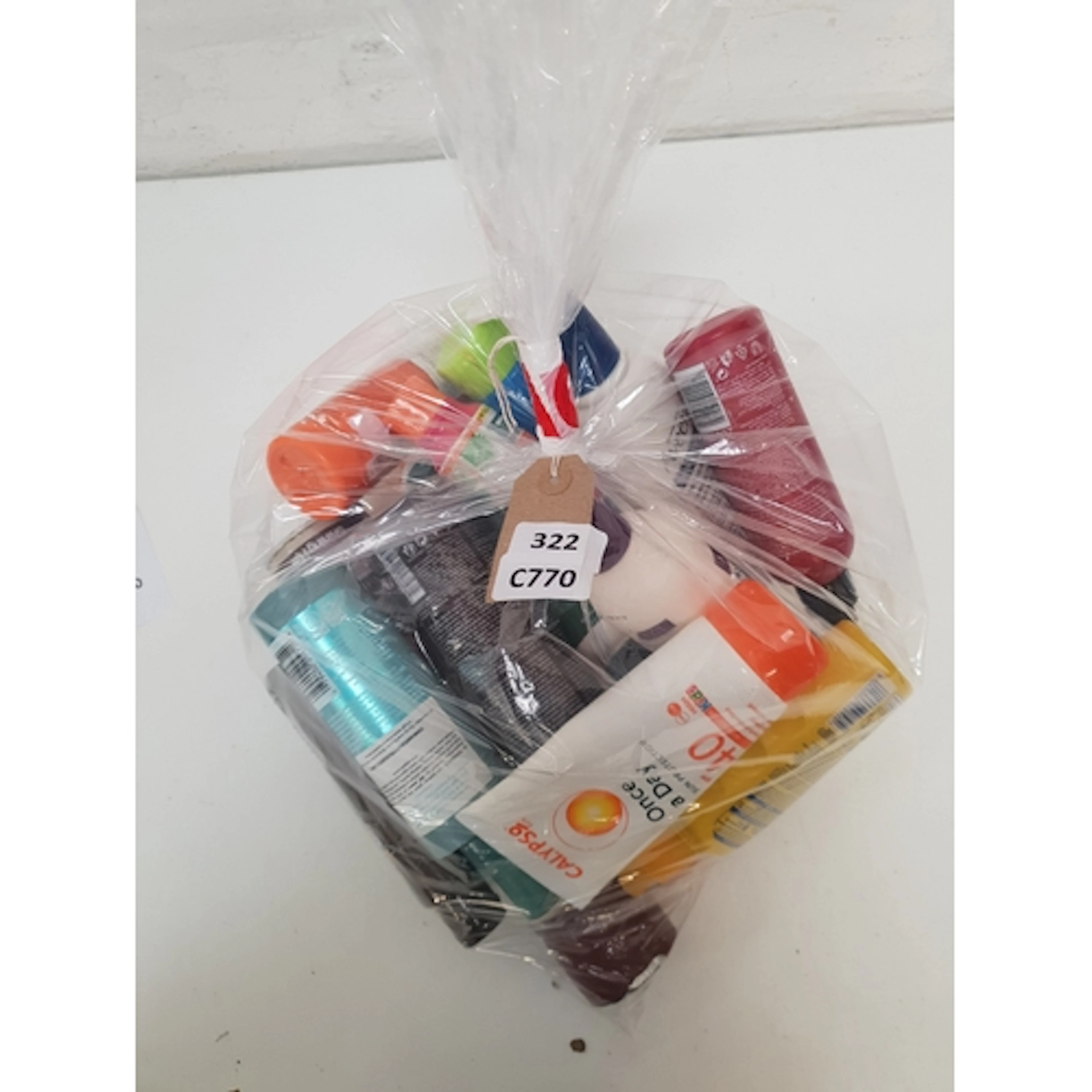 ONE BAG OF USED COSMETICS including Aveeno and Piz Buin