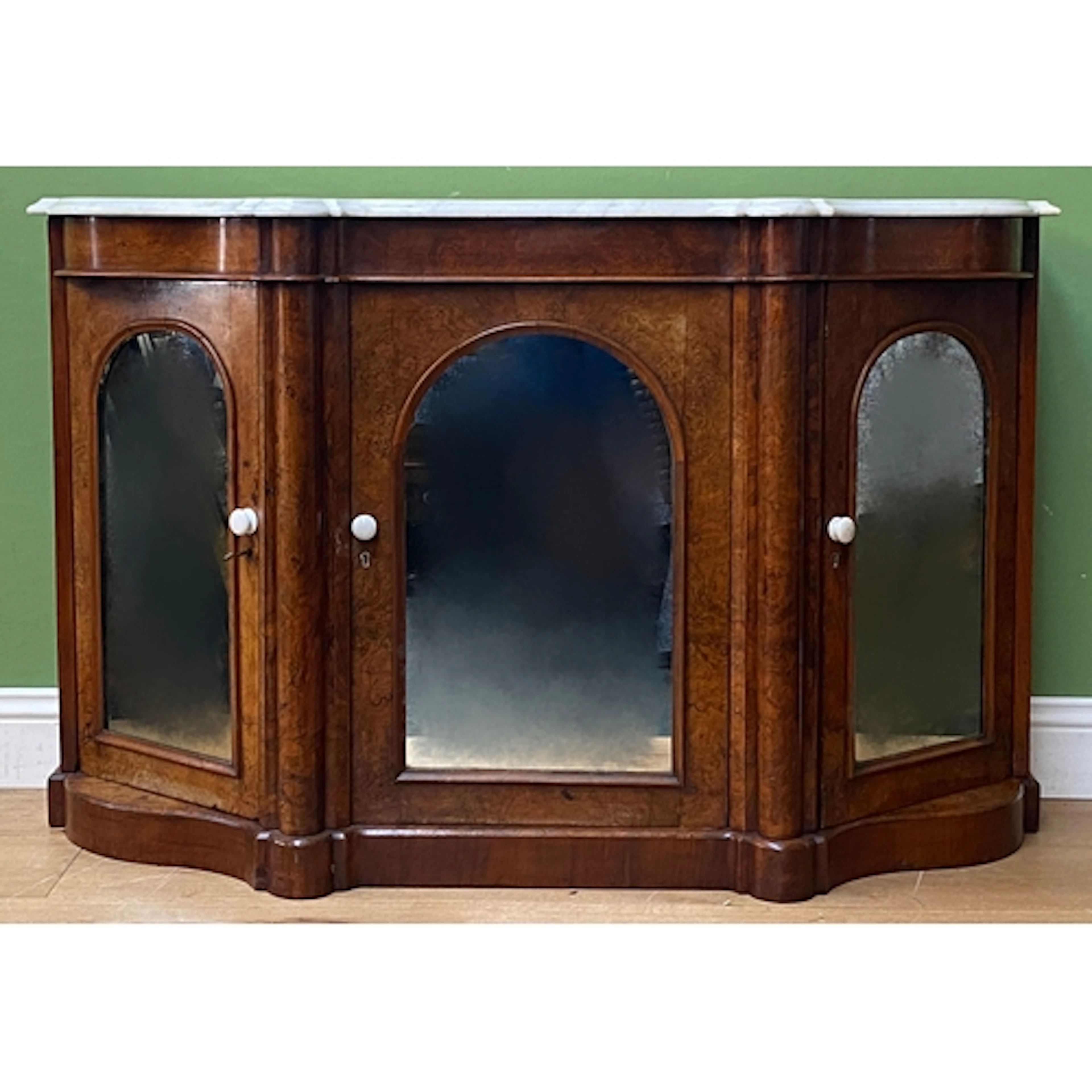 A Victorian burr walnut and marble topped credenza or sidebo...