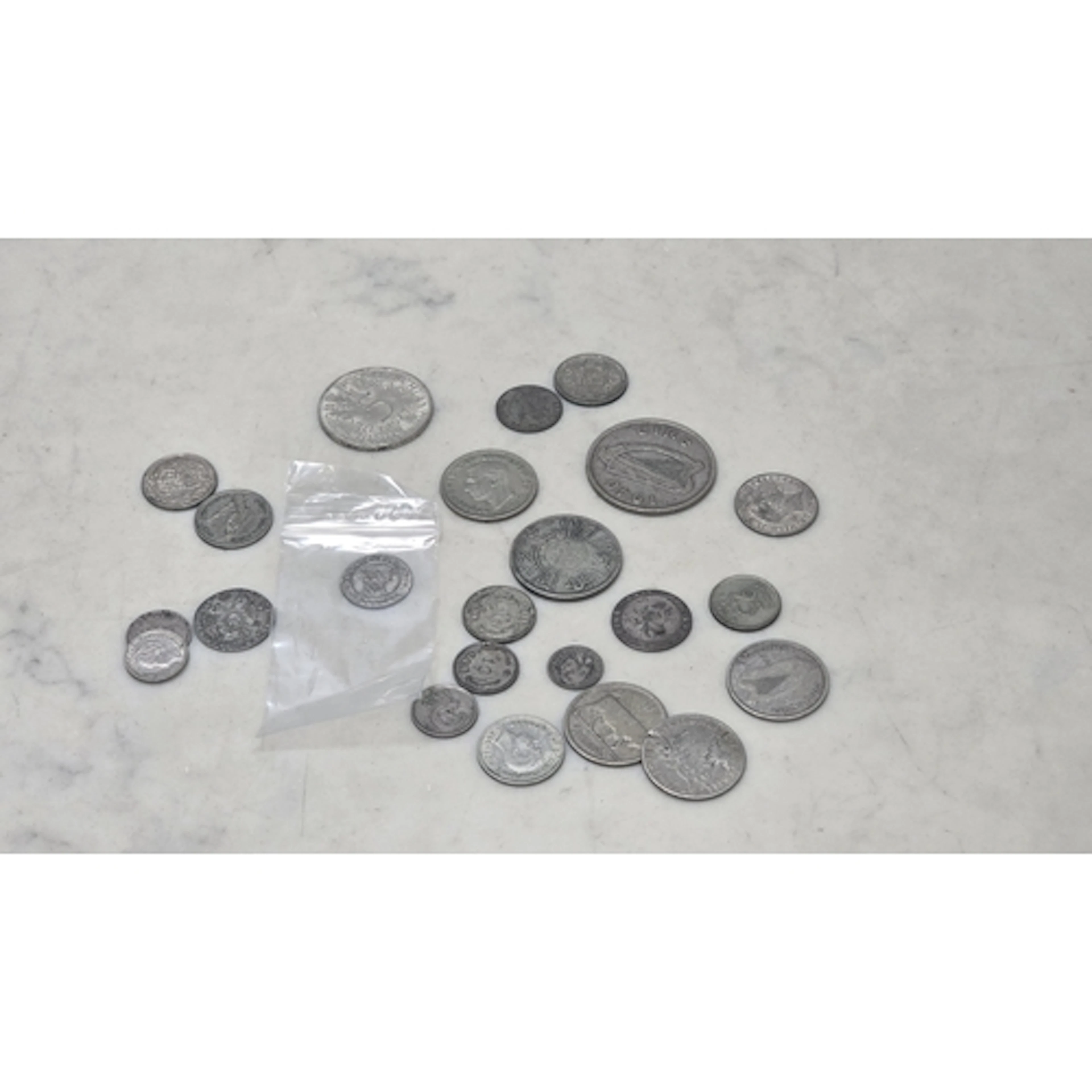 A small collection of World silver Coins, to include a Genev...
