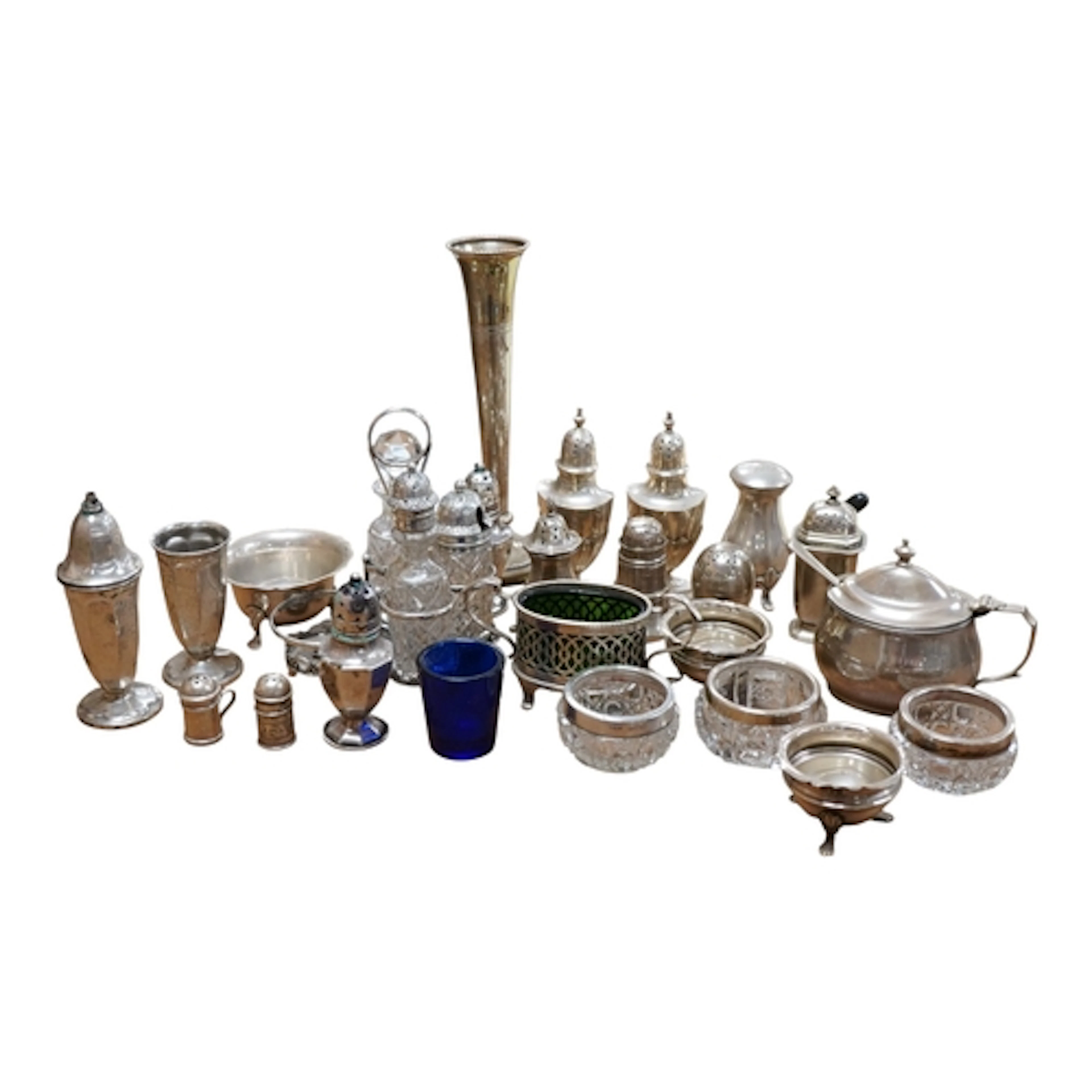 A late Victorian silver cruet stand with four glass cruets, ...