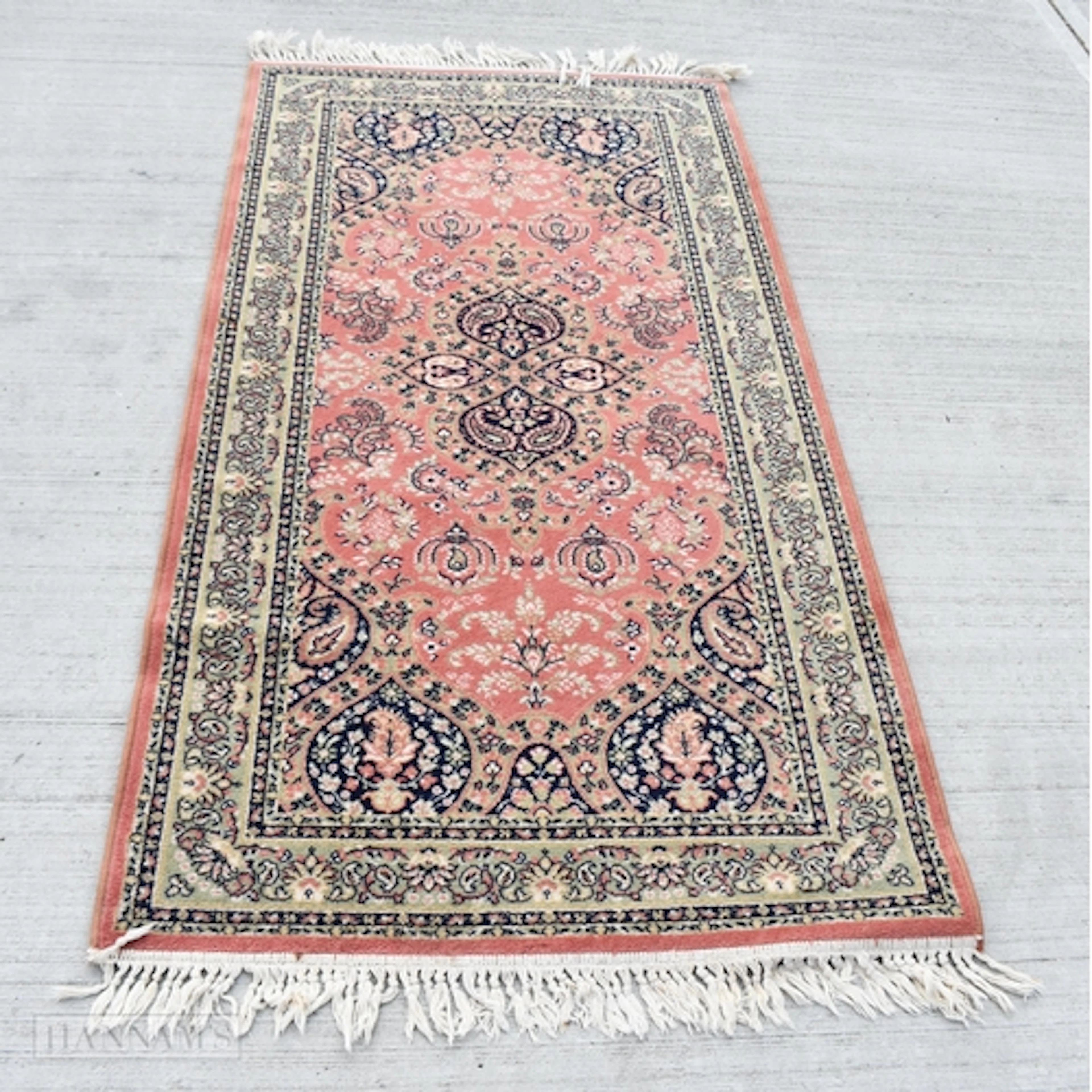 A European wool rug 178 x 90cm