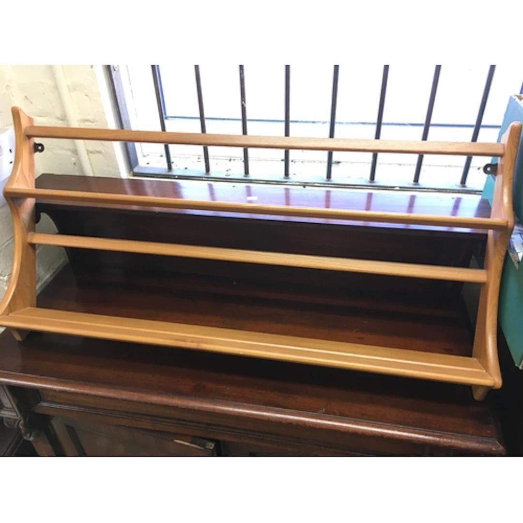 An Ercol plate rack. 38 inches wide.
