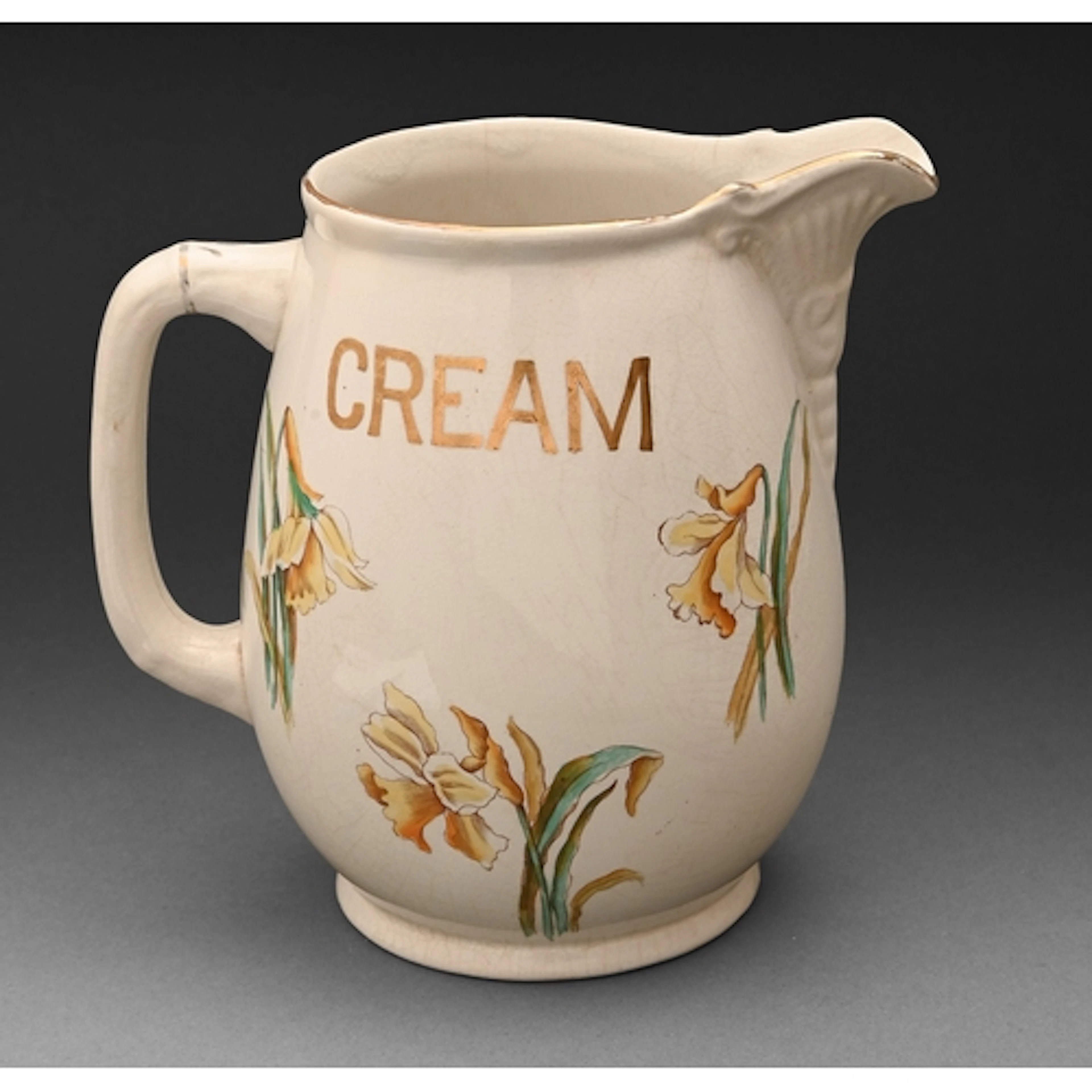 An Edwardian dairyman's earthenware jug, printed and painted...