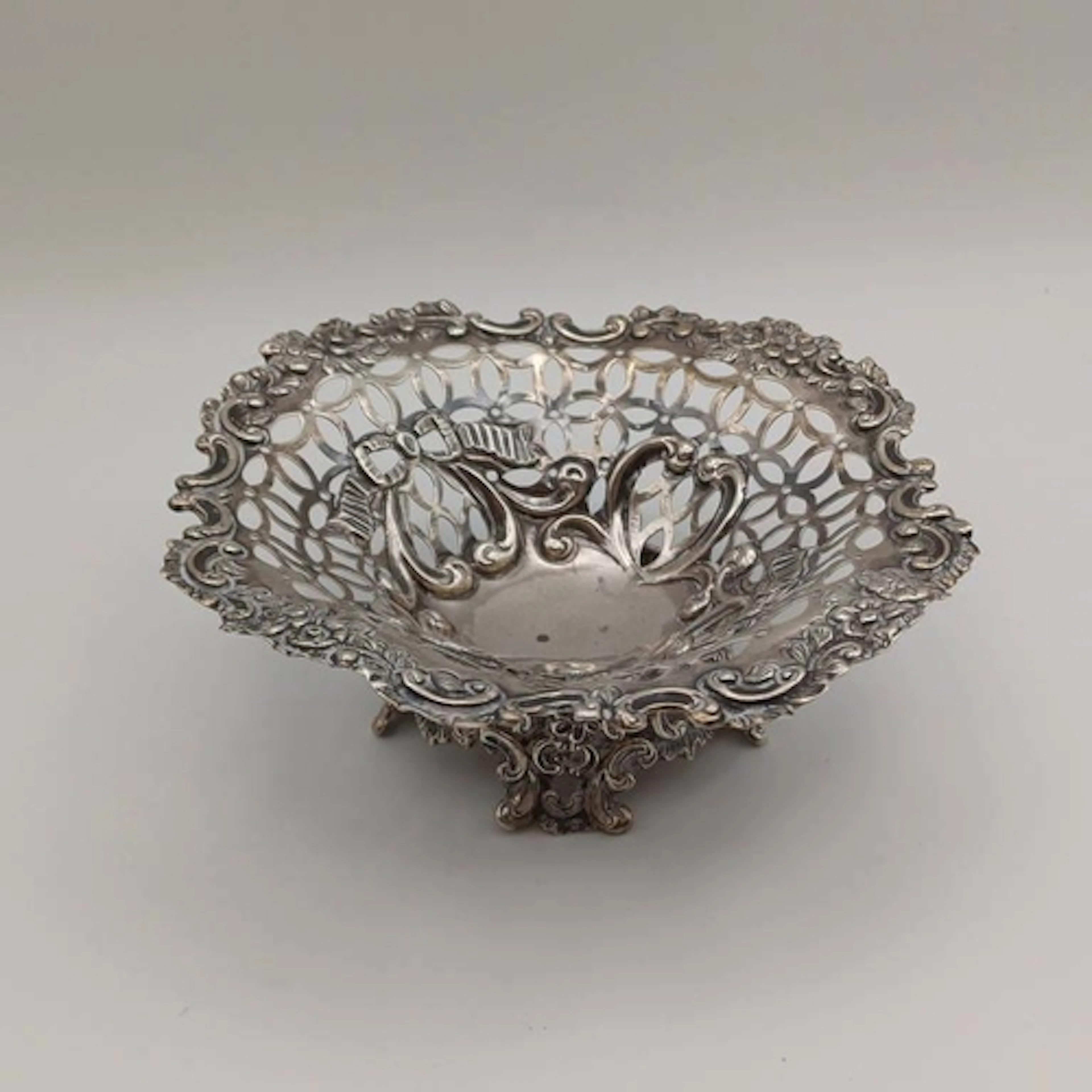 A VICTORIAN SILVER BON BON DISH WITH PIERCED, FLORAL & RIBBO...