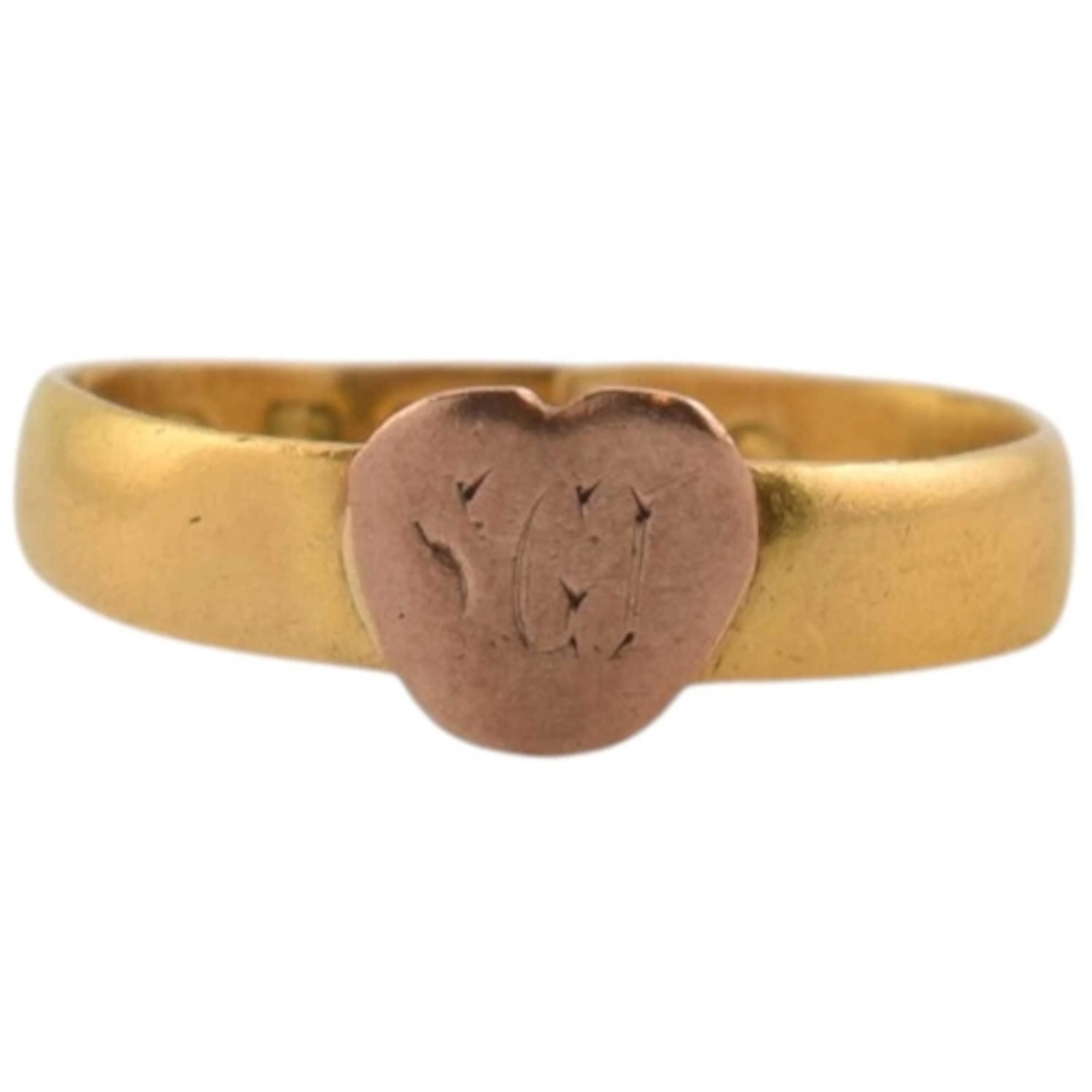 An early Victorian 22ct gold band ring topped with a later g...
