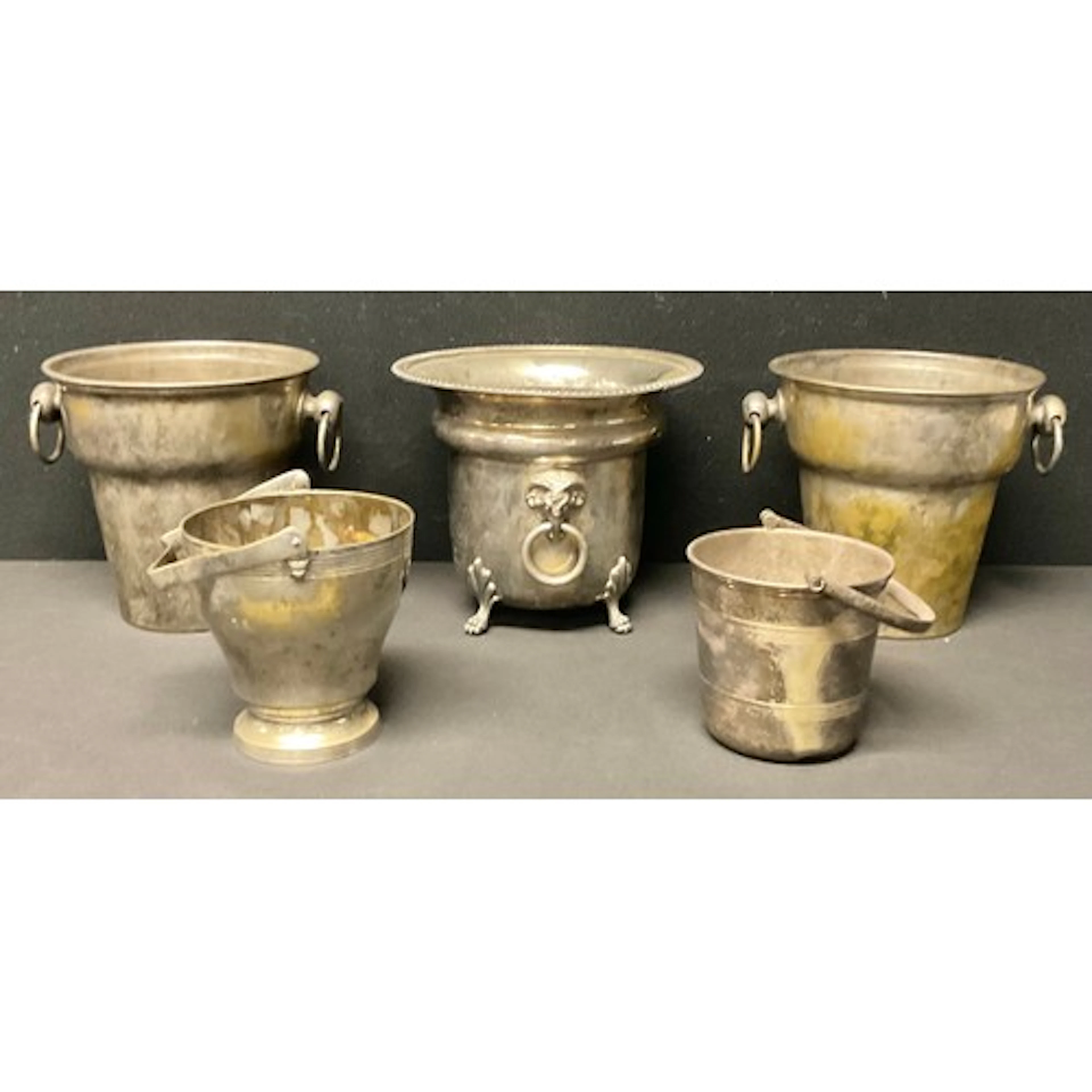 A pair of early 20th century plated wine coolers, swing hand...