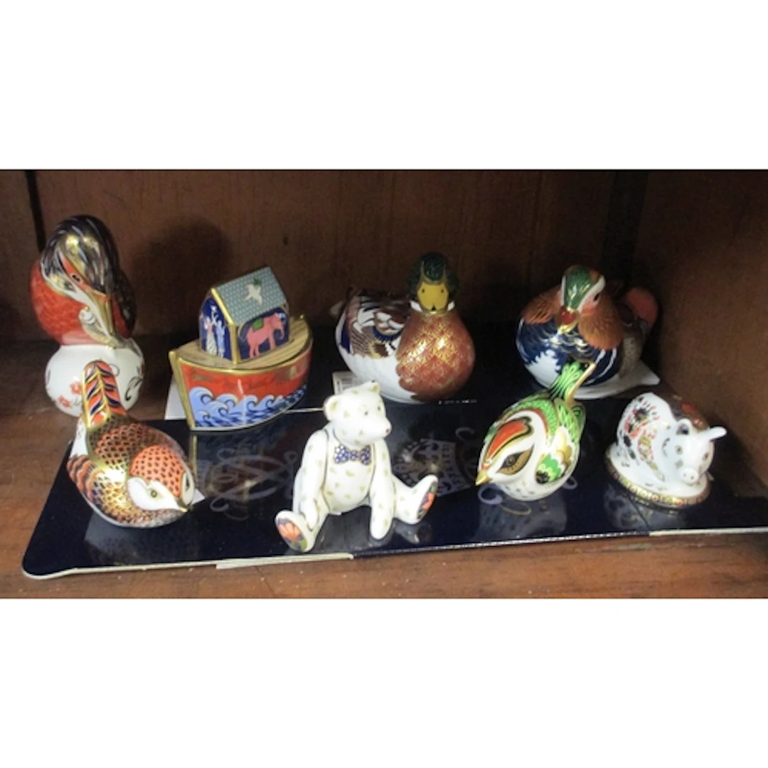 Group of six Royal Crown Derby paperweights, all with silver...