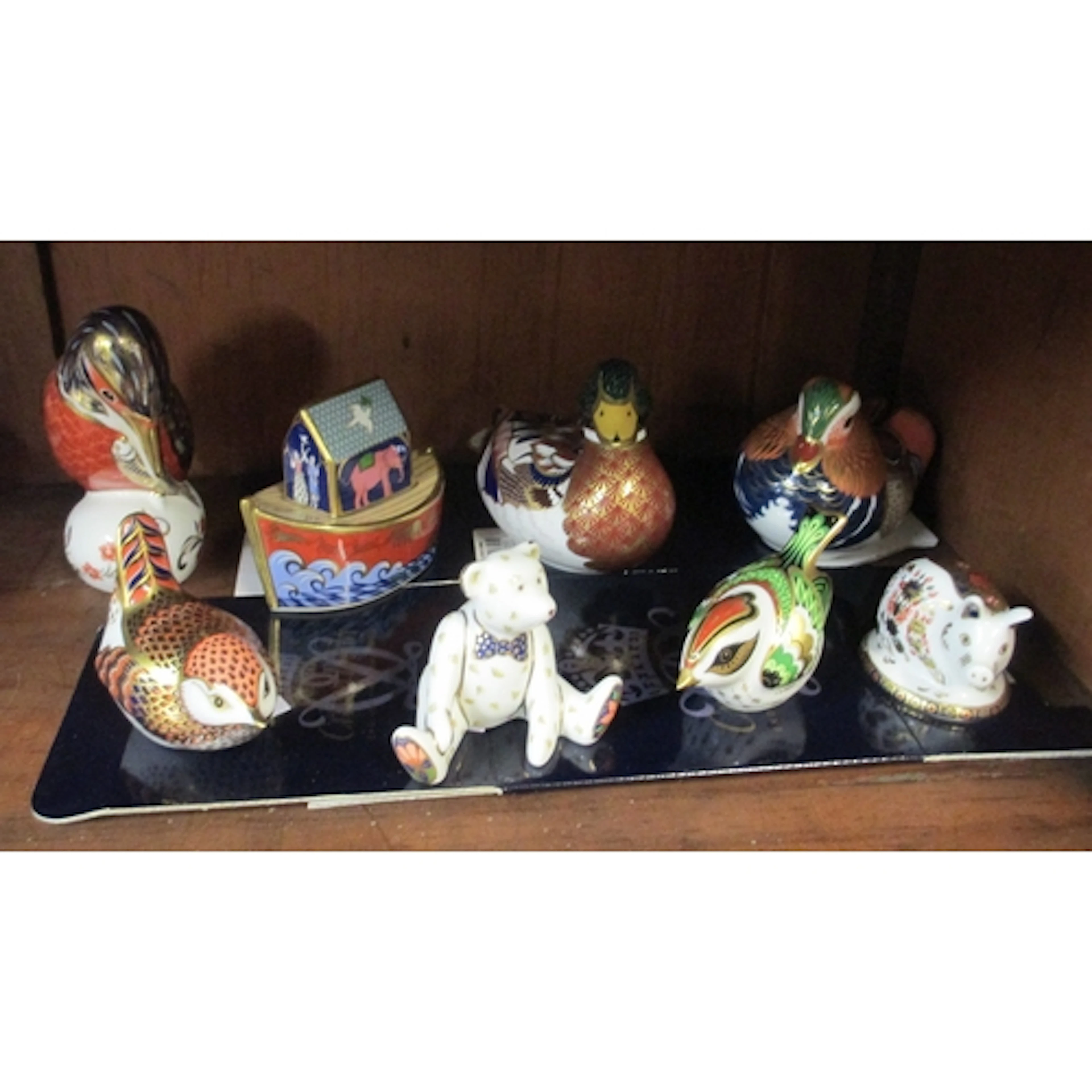 Group of six Royal Crown Derby paperweights, all with silver...