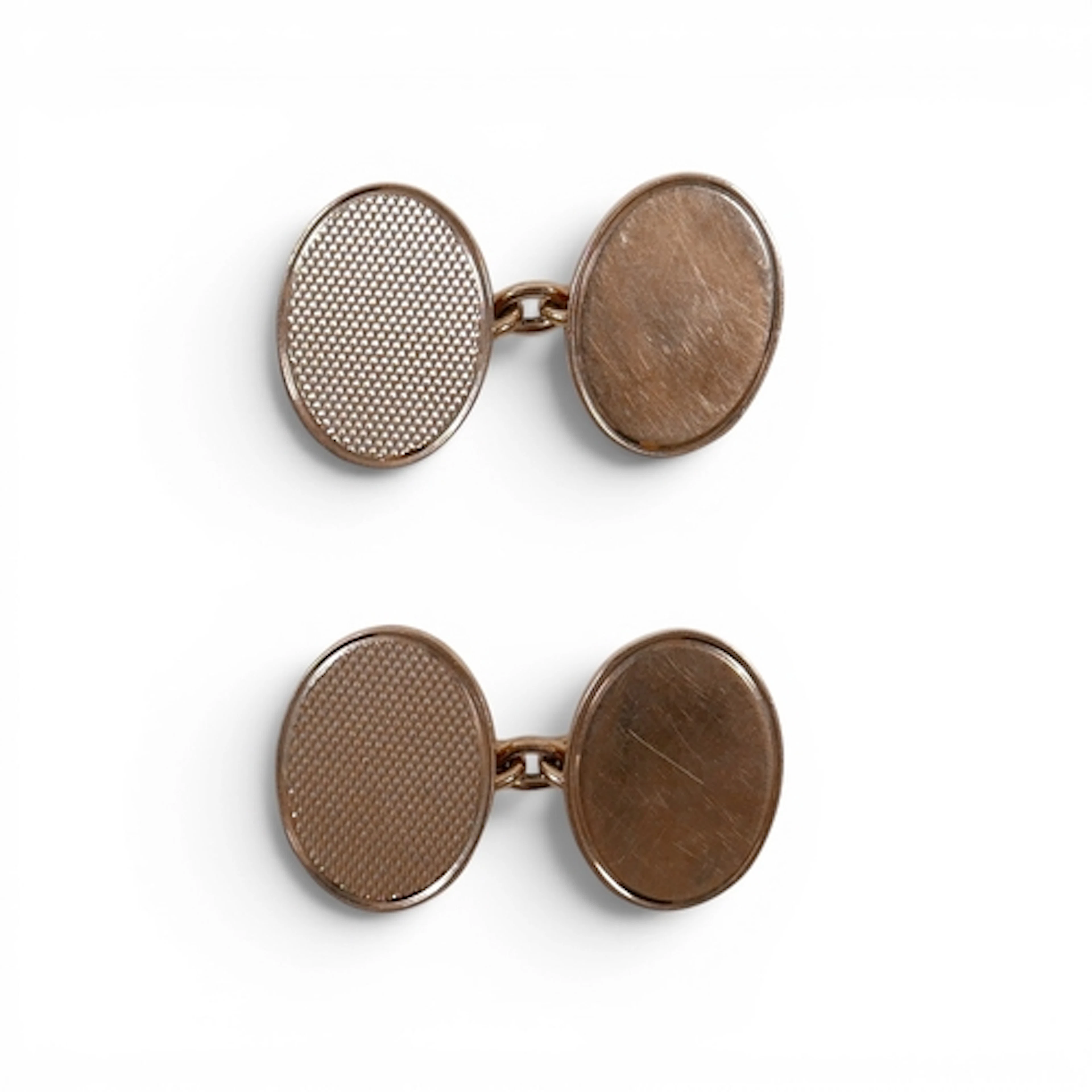 A PAIR OF GARRARD 9CT CUFFLINKS. 9ct gold gents oval cufflin...