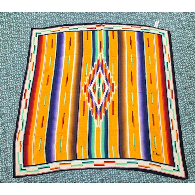 Three designer silk scarfs by Calvin Klein, Christian Dior a...