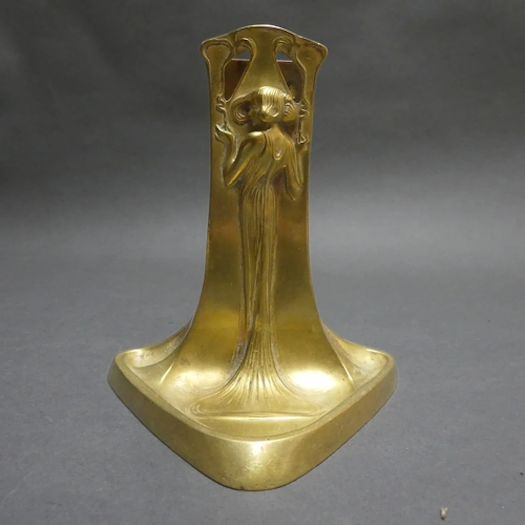 An Art Nouveau design gilt bronze matchbox holder, frontal A...