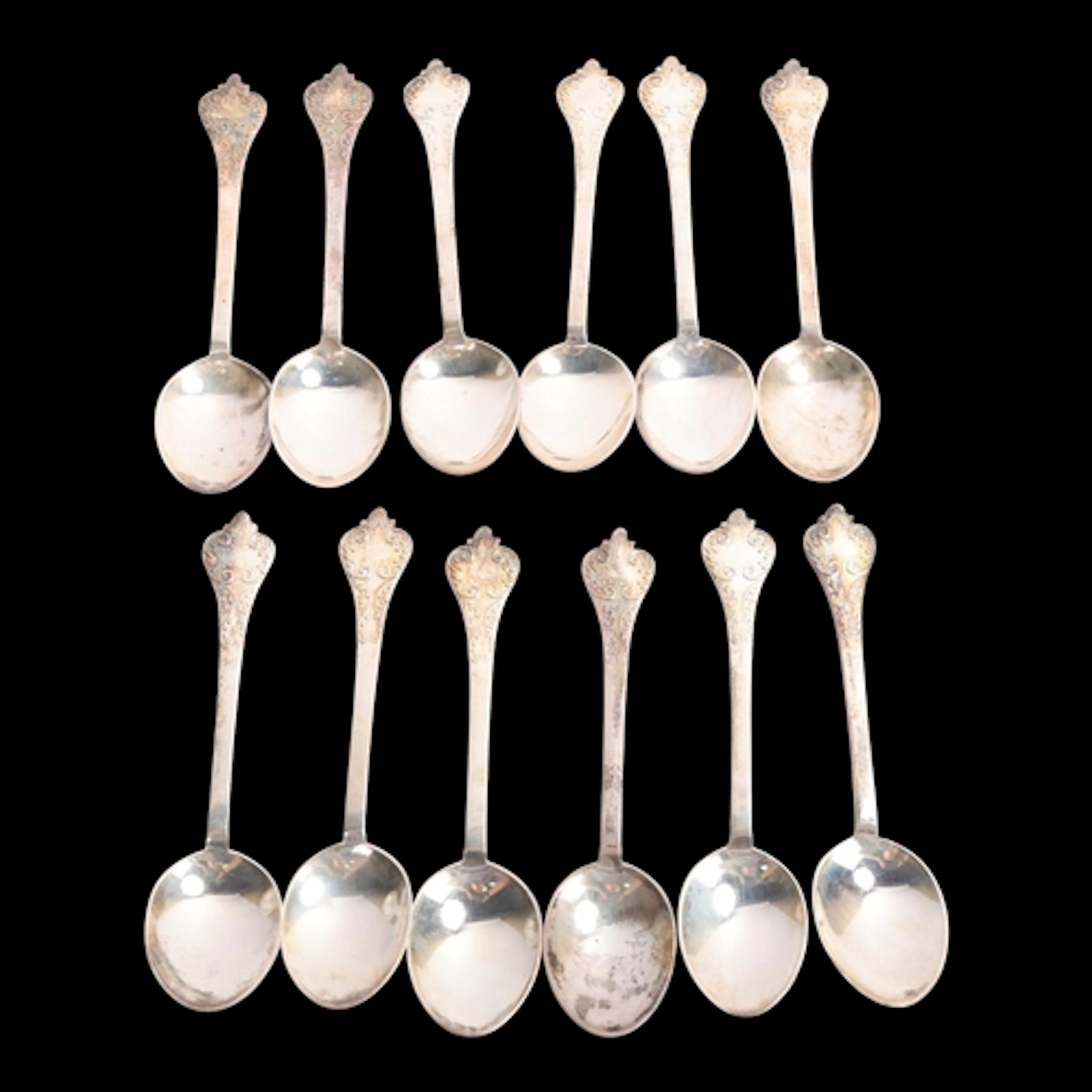 A set of 12 late Victorian Scottish Britannia standard silve...
