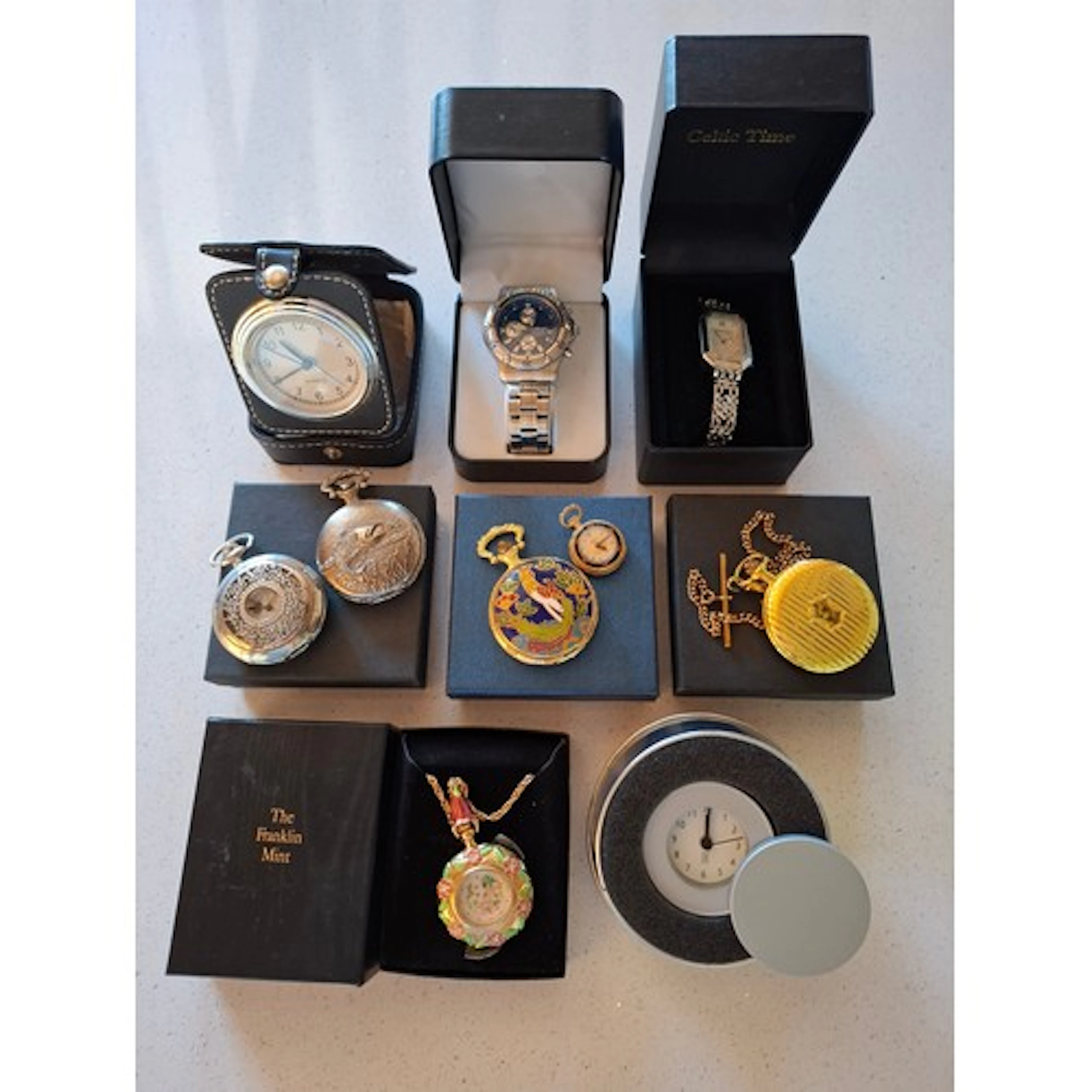 A small group of watches and travel clocks to include a Fran...