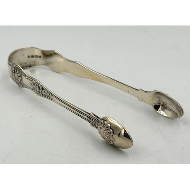 A pair of Victorian silver sugar tongs, hallmarked for Londo...